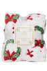 christmas blanket featuring wreaths with red bow wrapped in packaging