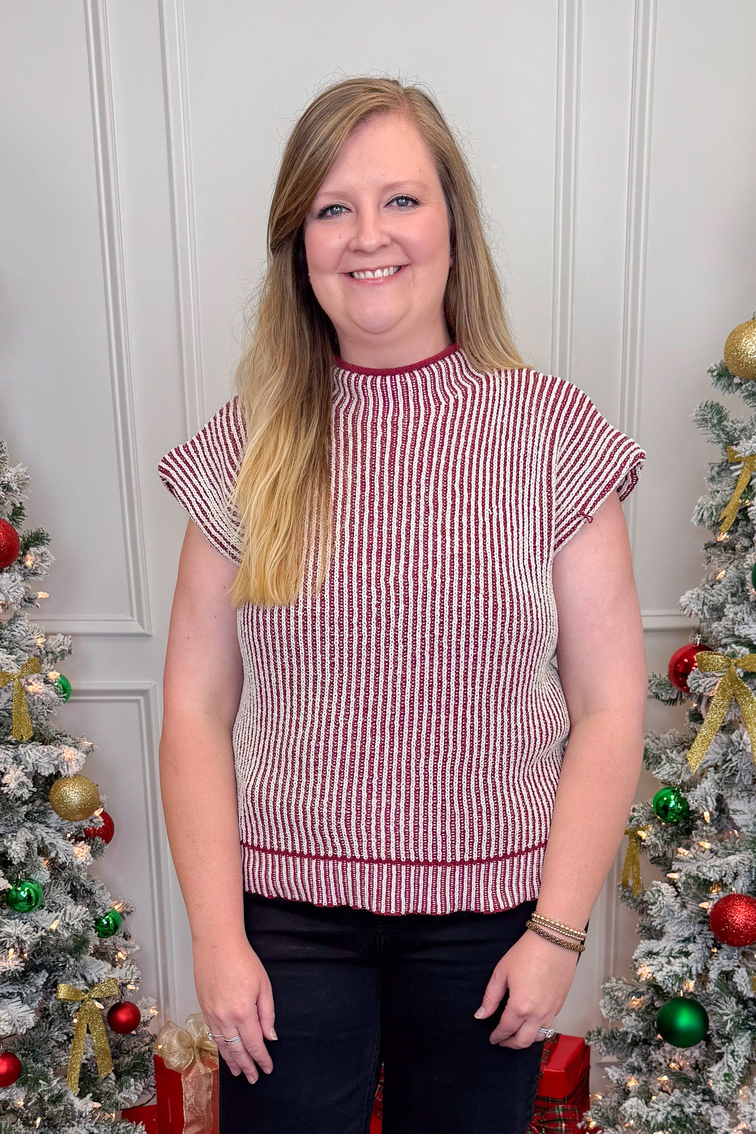 woman wearing red ribbed short sleeve sweater