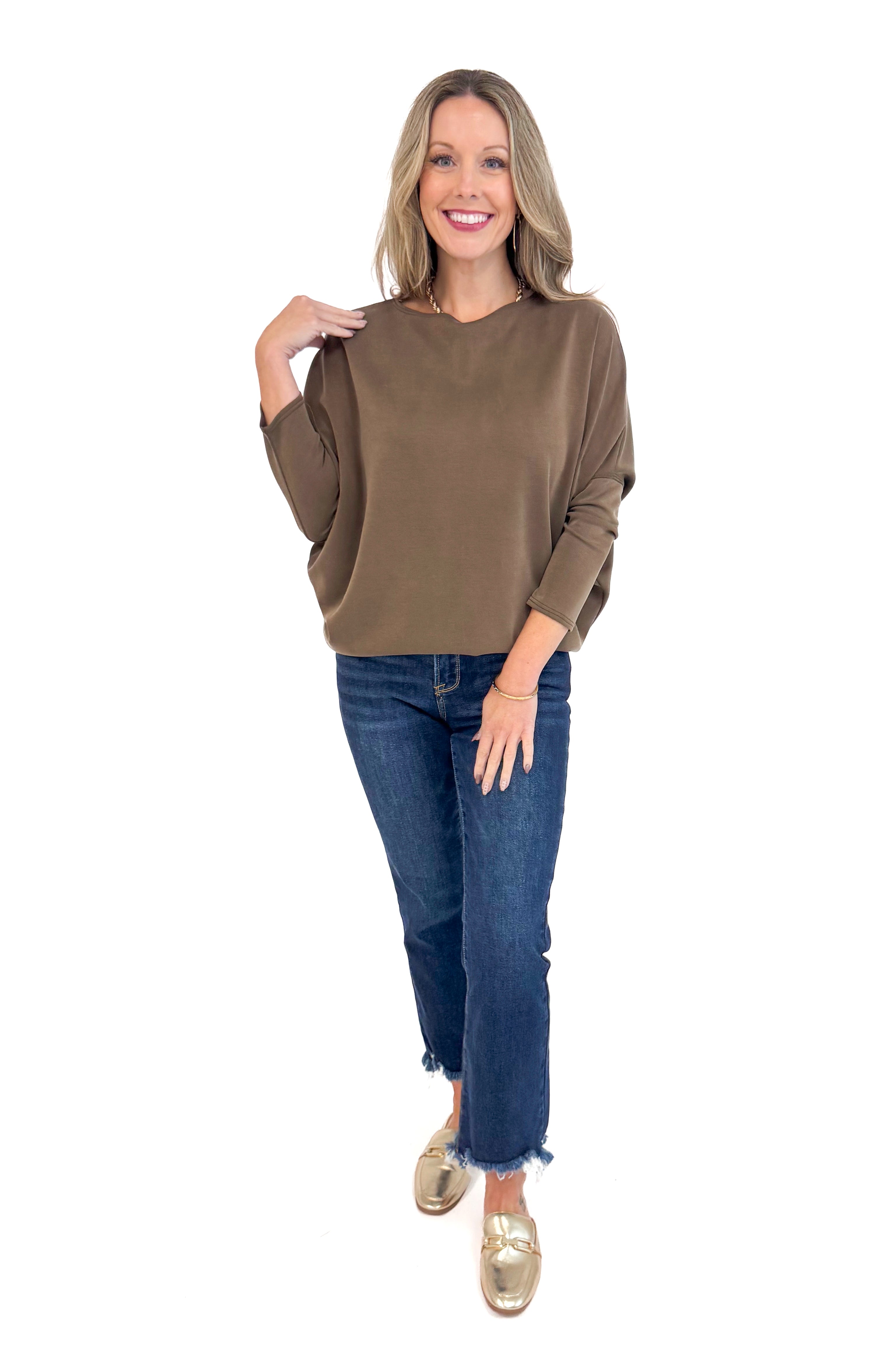 Woman wearing For Keeps Brown Boatneck Dolman Sleeve Top - front view showing elegant boatneck and relaxed dolman sleeves