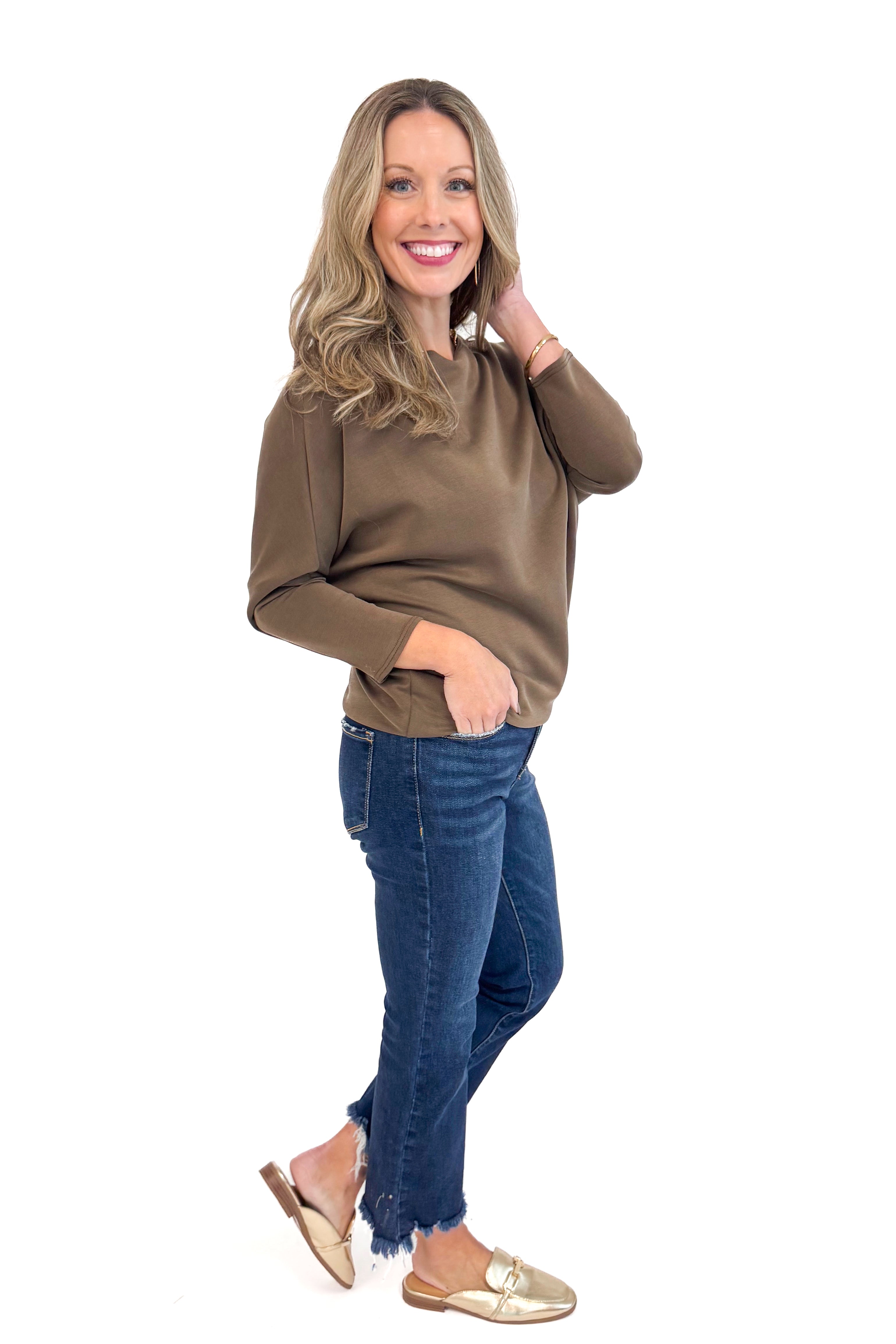 Woman wearing For Keeps Brown Boatneck Dolman Sleeve Top - side view showing elegant boatneck and relaxed dolman sleeves