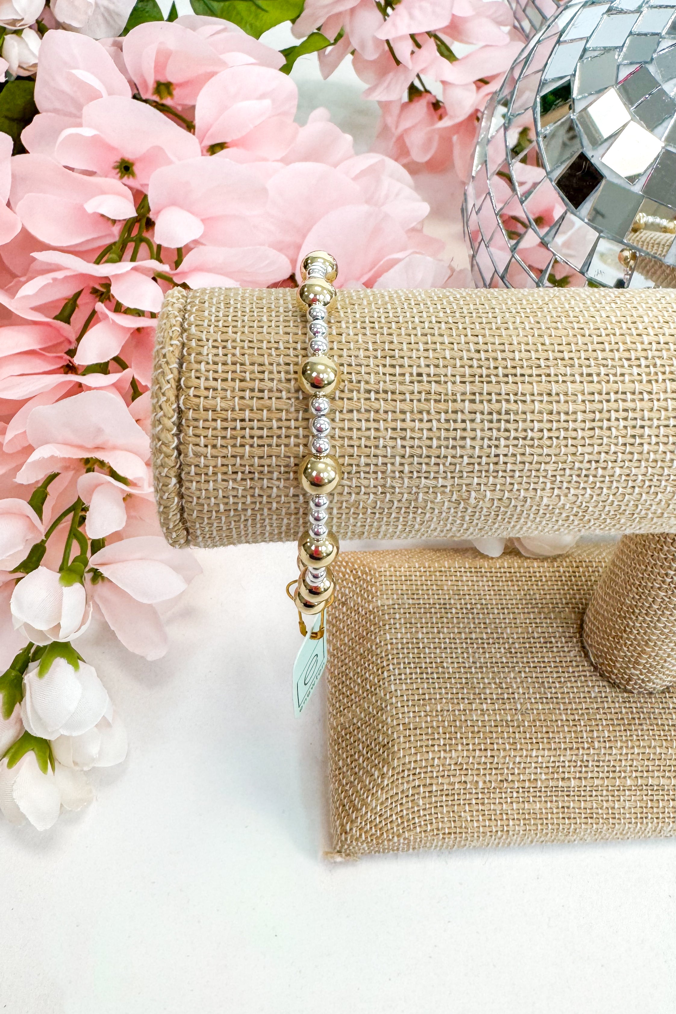 mixed metal enewton bracelet on burlap display