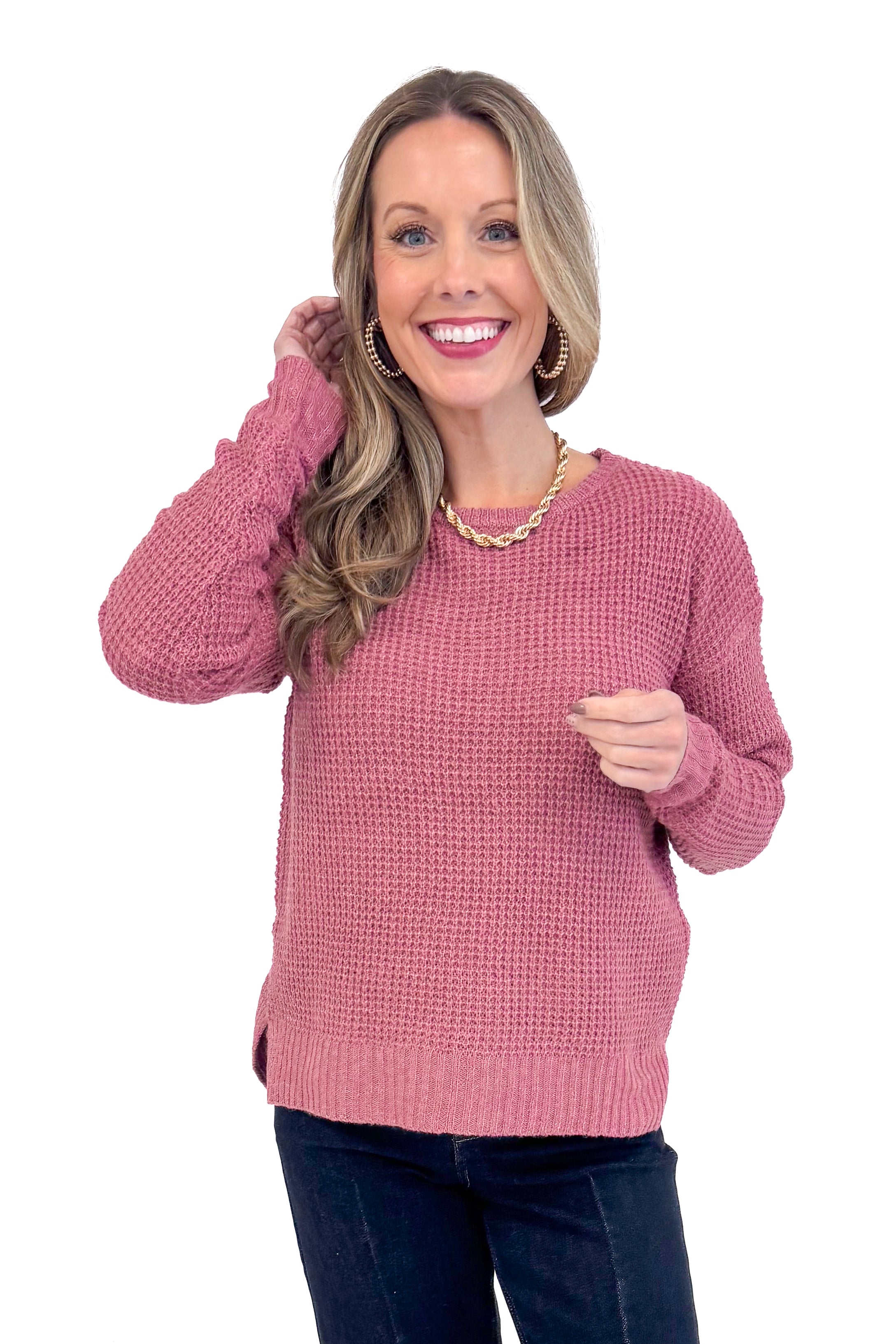 Front picture of woman wearing Rose Waffle Knit Sweater and jeans.