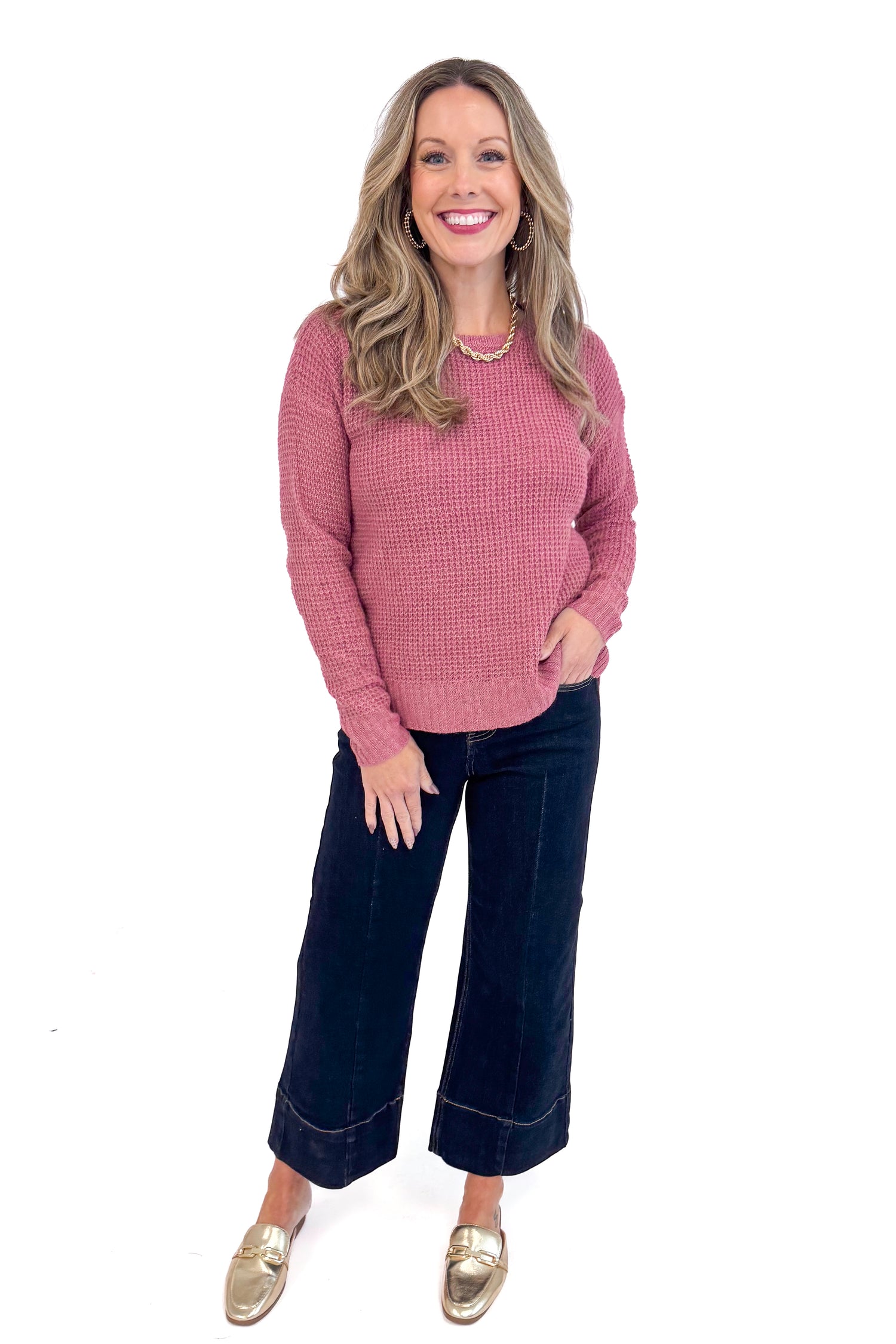 Front full picture of woman wearing Rose Waffle Knit Sweater and jeans.