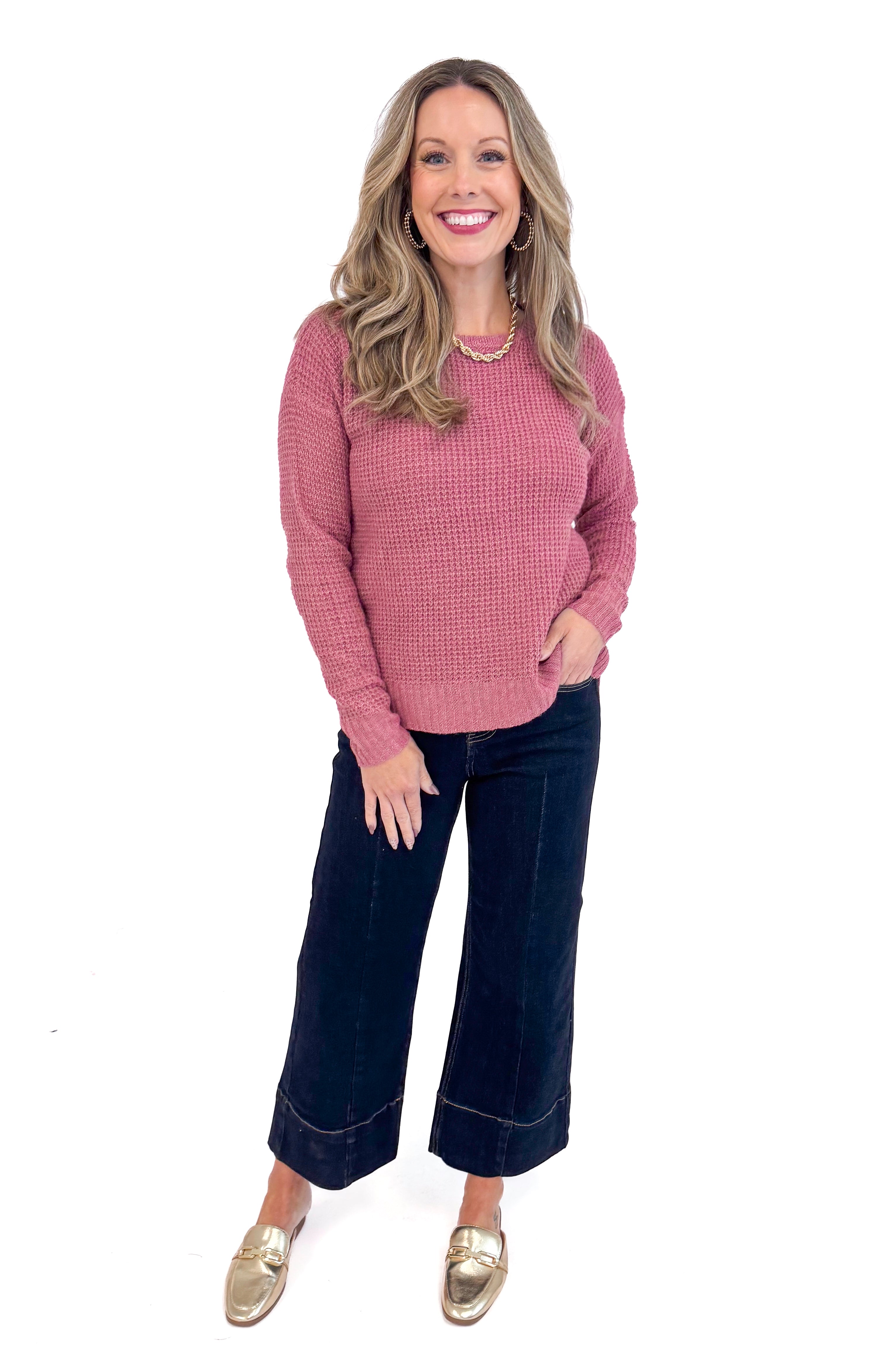 Front full picture of woman wearing Rose Waffle Knit Sweater and jeans.