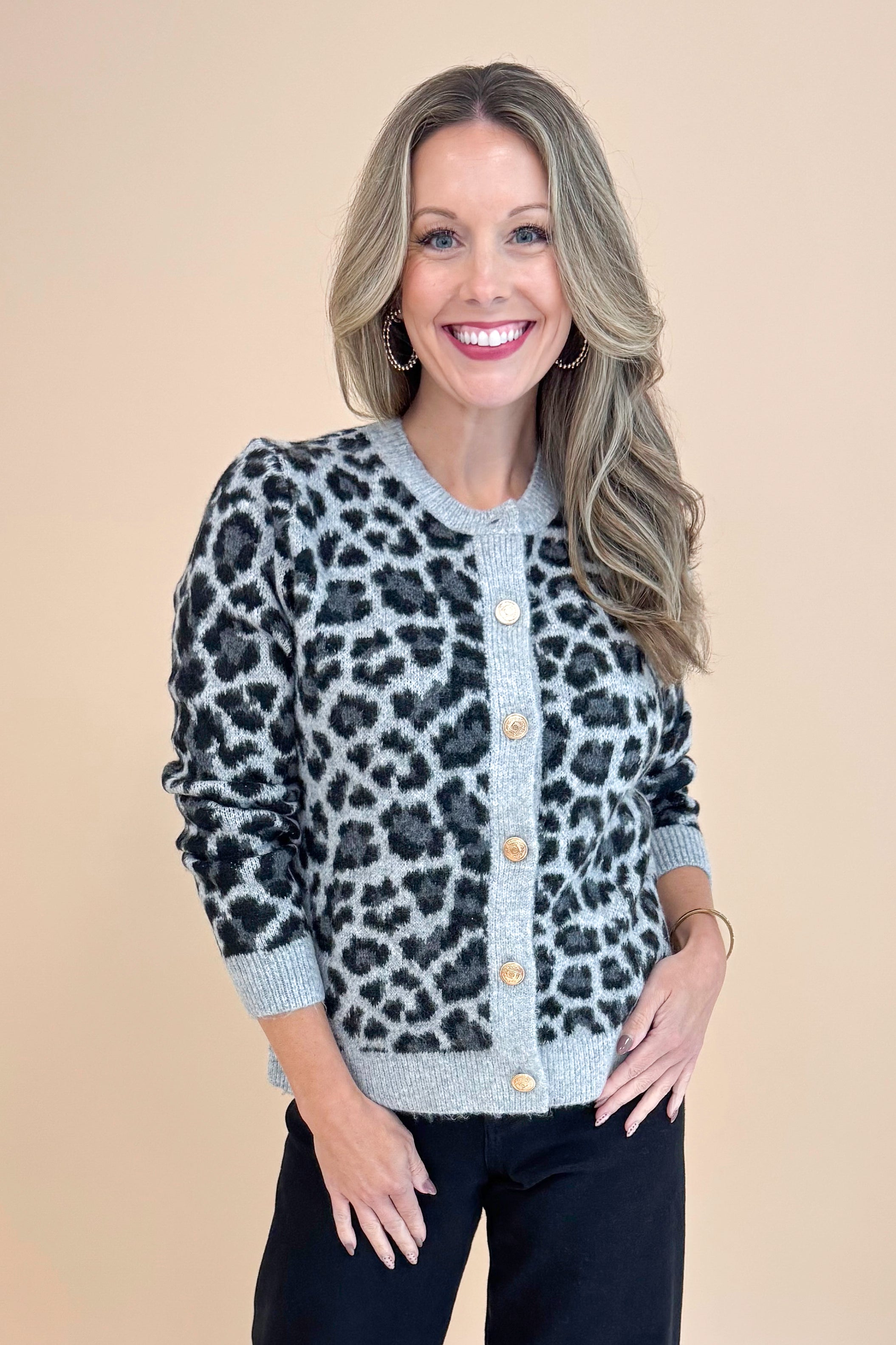 Front view of woman wearing Grey Leopard Button Up Cardigan.