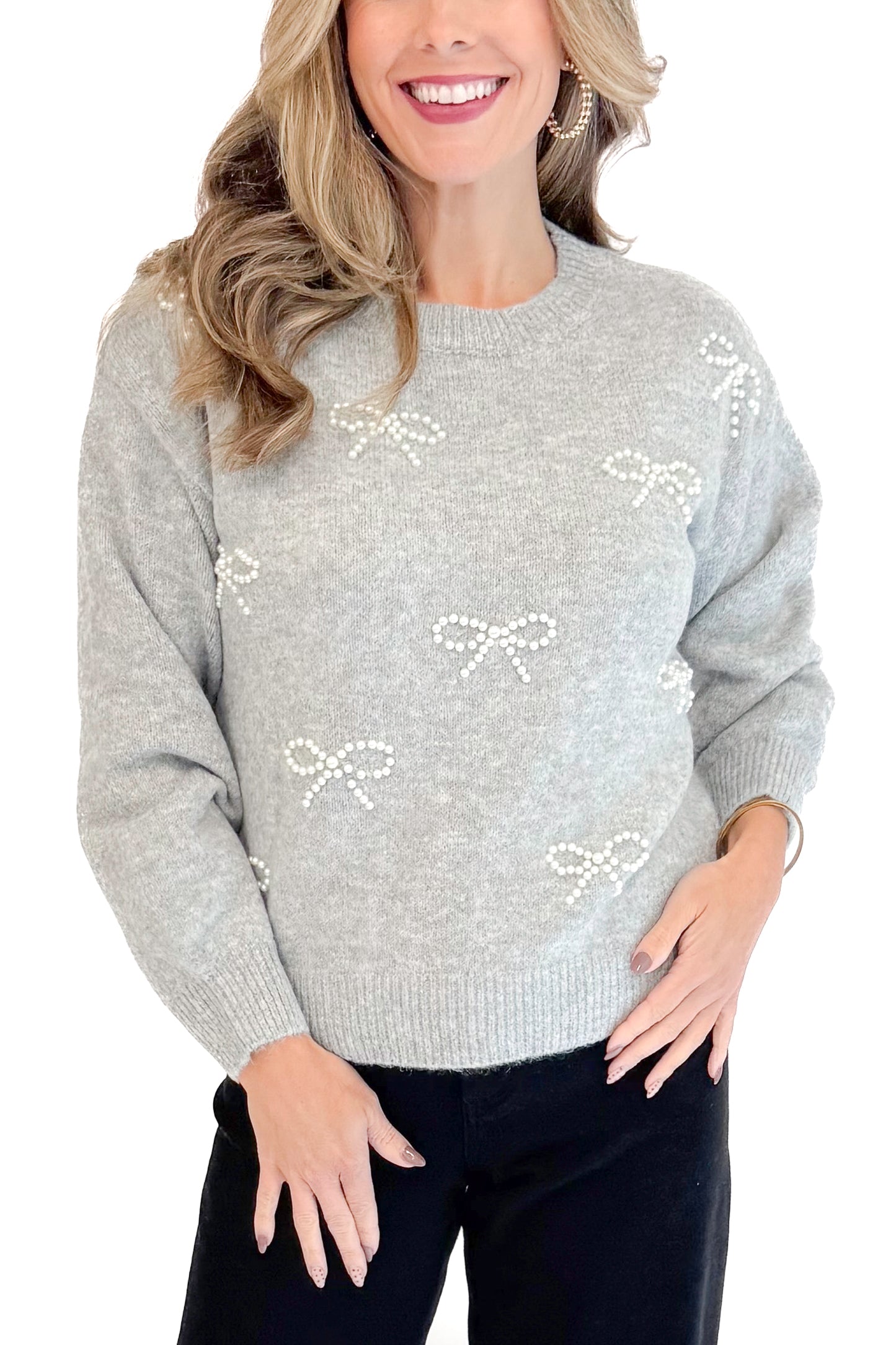 Detailed front view of woman wearing Grey Pearl Bow Detail Sweater.