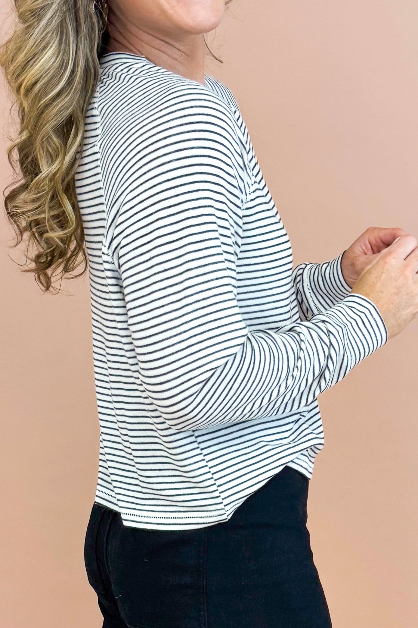 Bright Side navy and white striped sweater - side detail model shot
