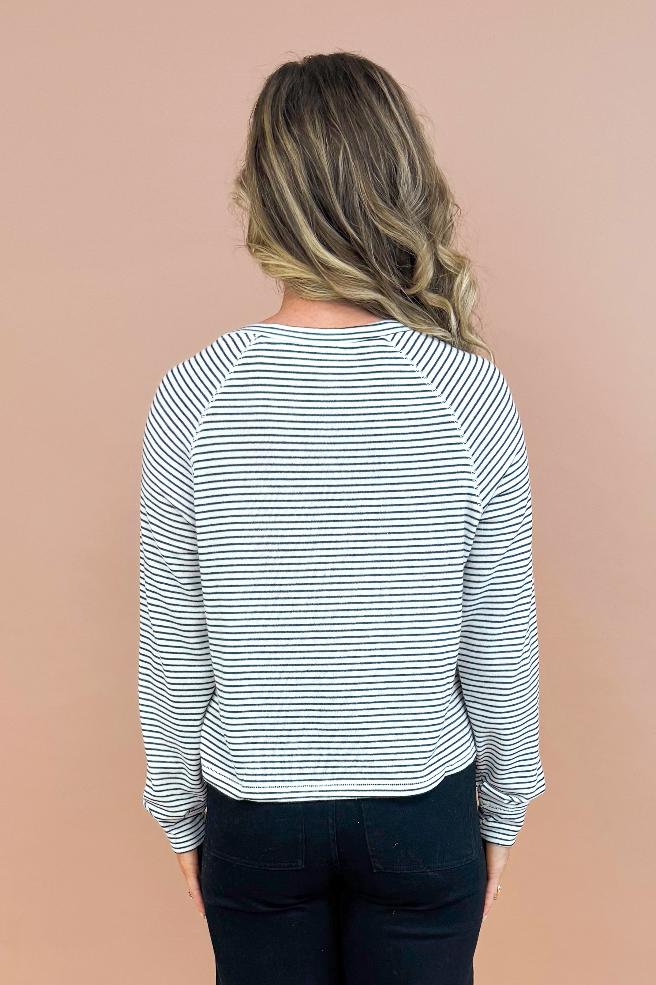 Bright Side navy and white striped sweater - back behind model shot