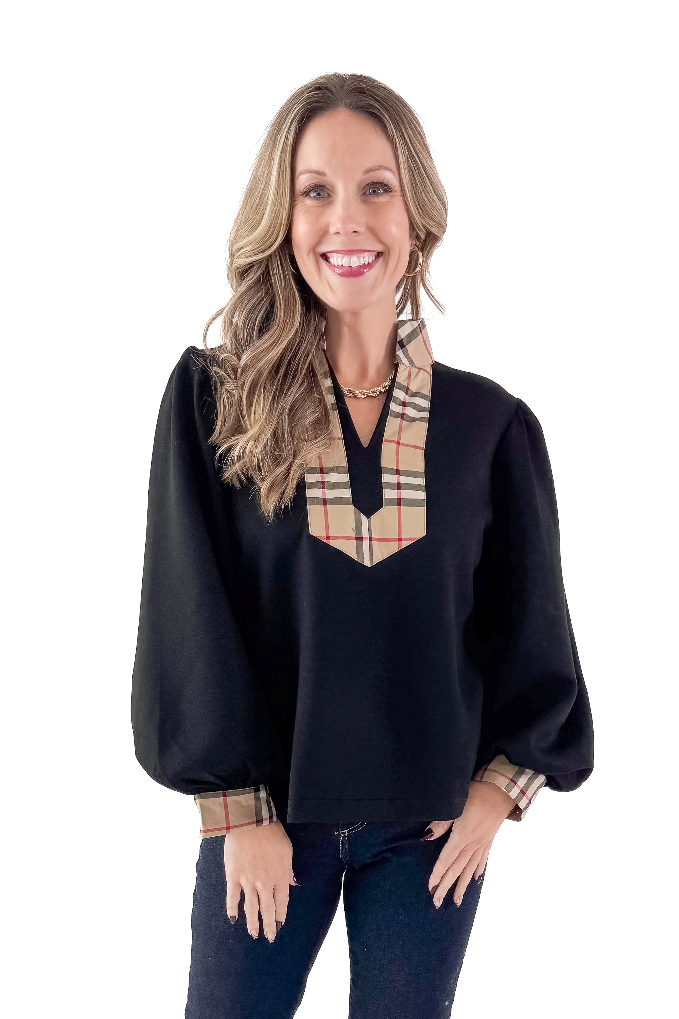 Front view of woman wearing Black With Plaid Contrast Detail Top with jeans against white studio background.