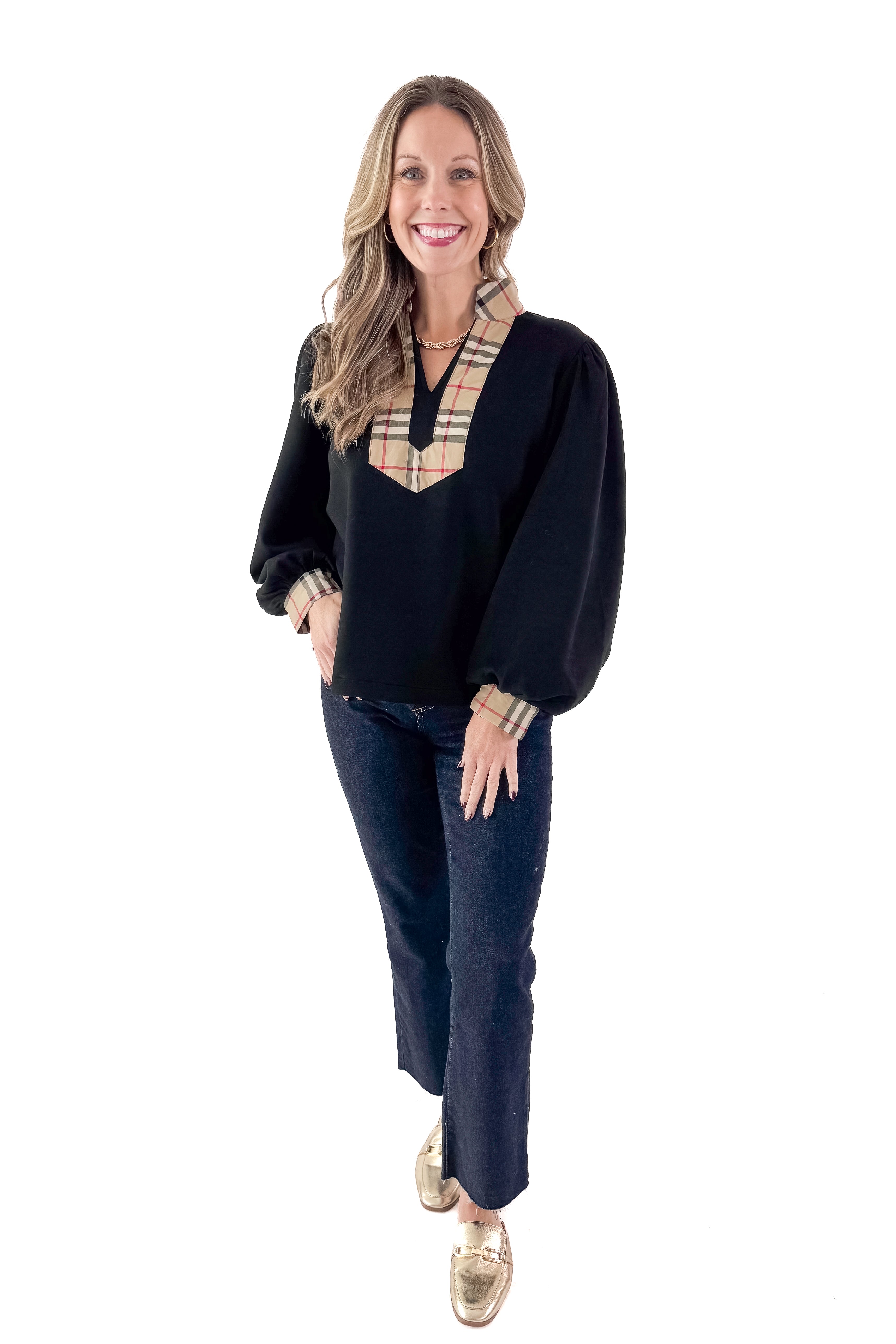 Front view of woman wearing Black With Plaid Contrast Detail Top with jeans against white studio background.