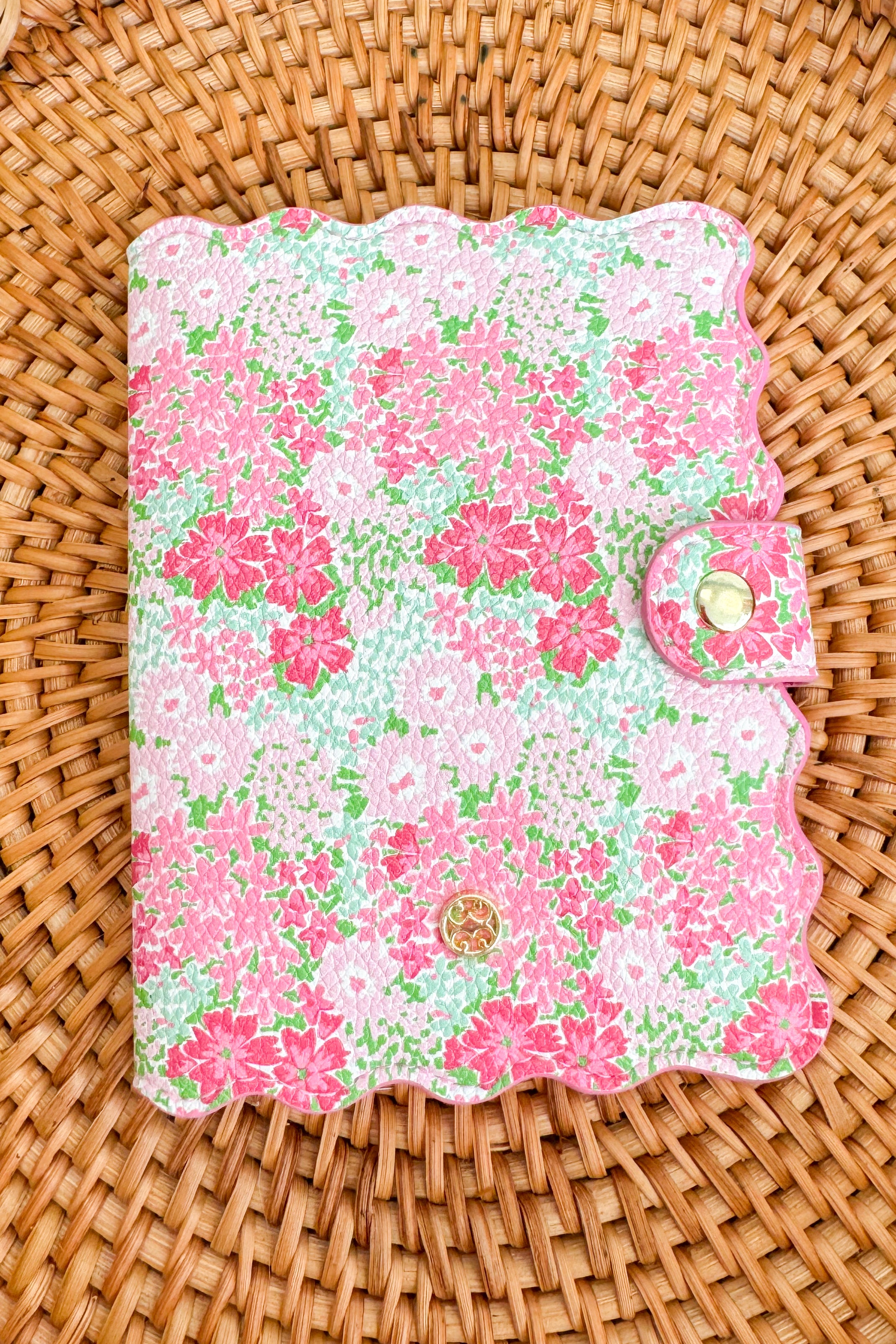 Floral patterned case on a woven surface