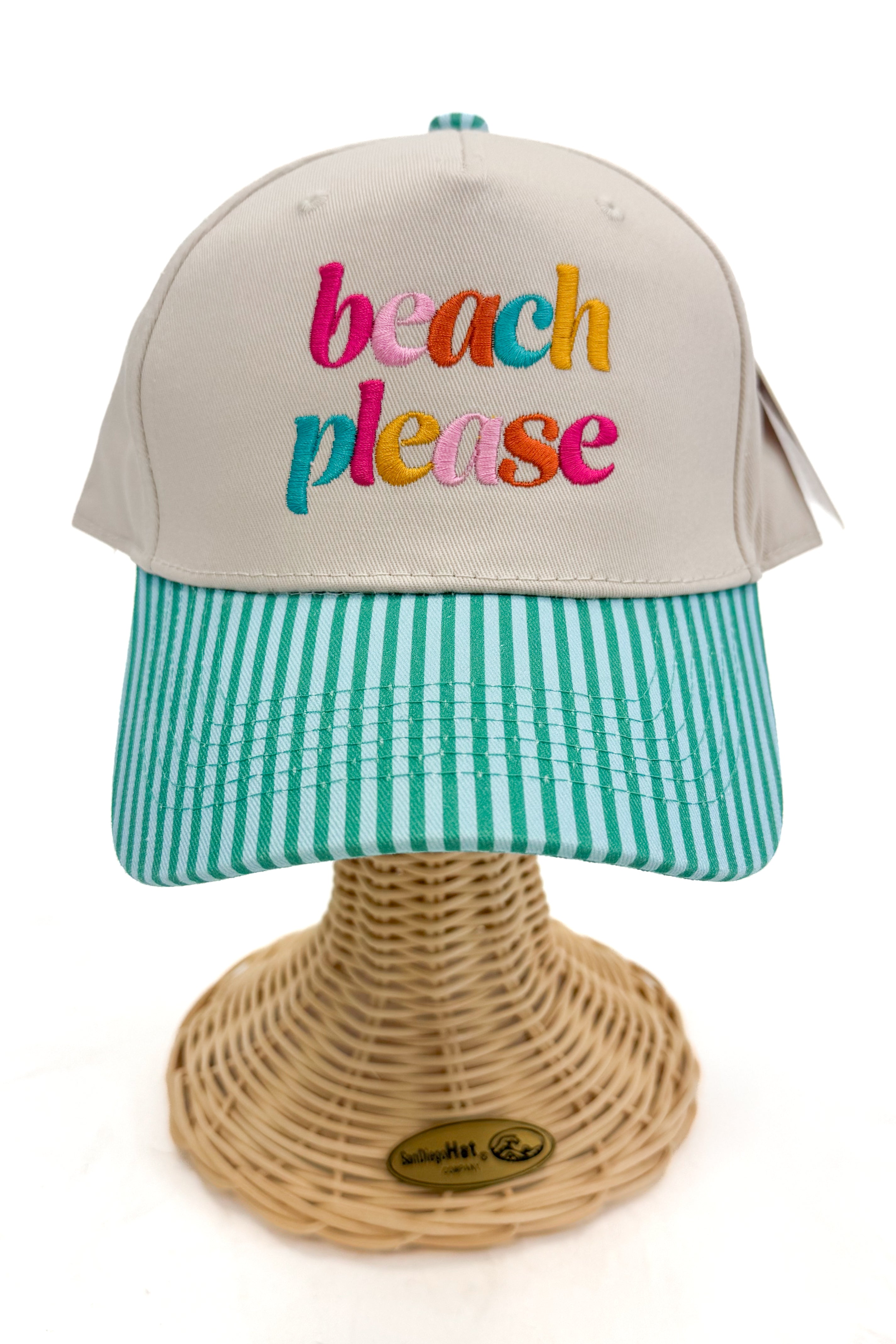 Front view of a striped-brim trucker hat with “beach please” embroidered on the front.