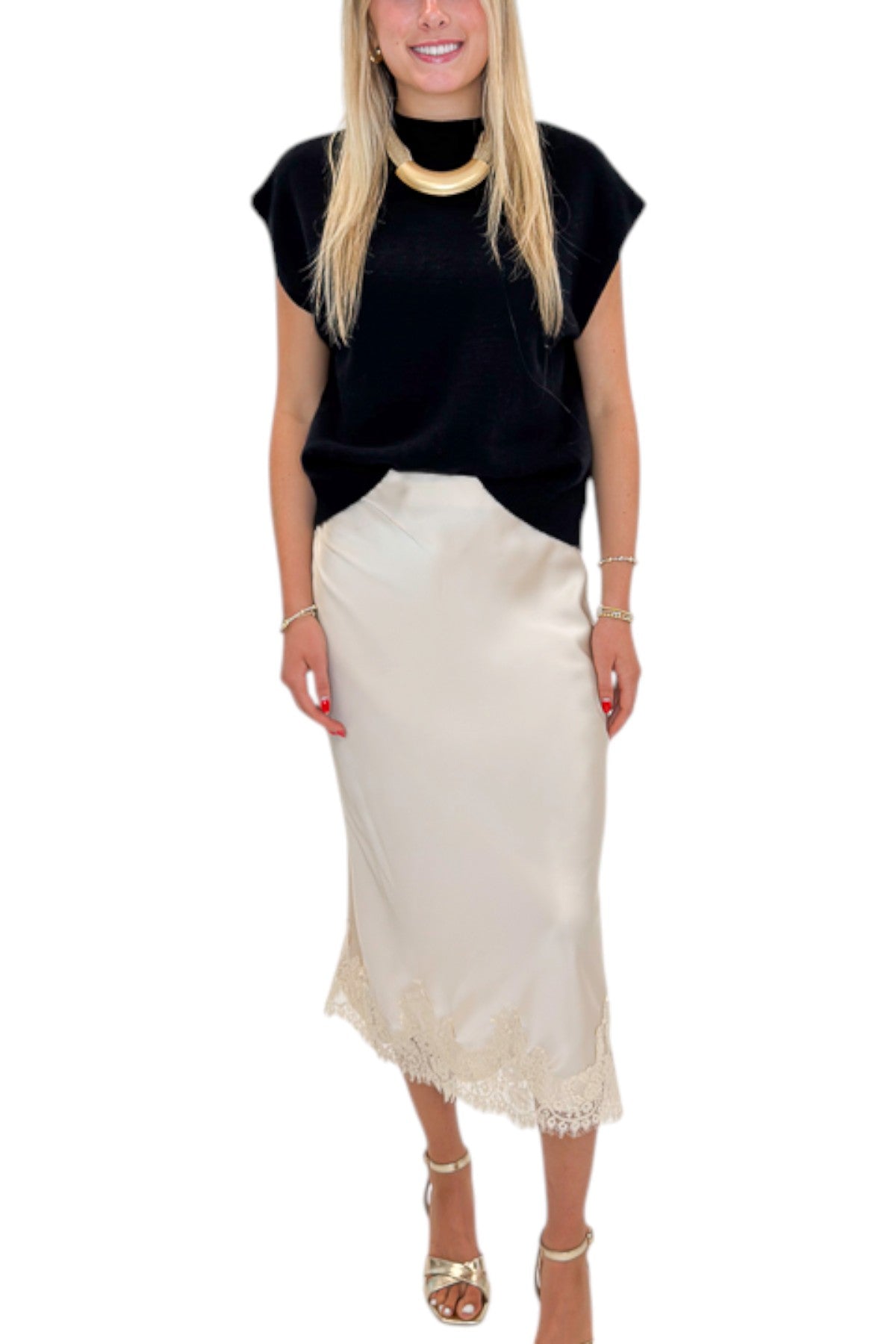 Front view of woman wearing Swagger Boutique’s Beige Satin & Lace Midi Skirt with heels against white studio background.