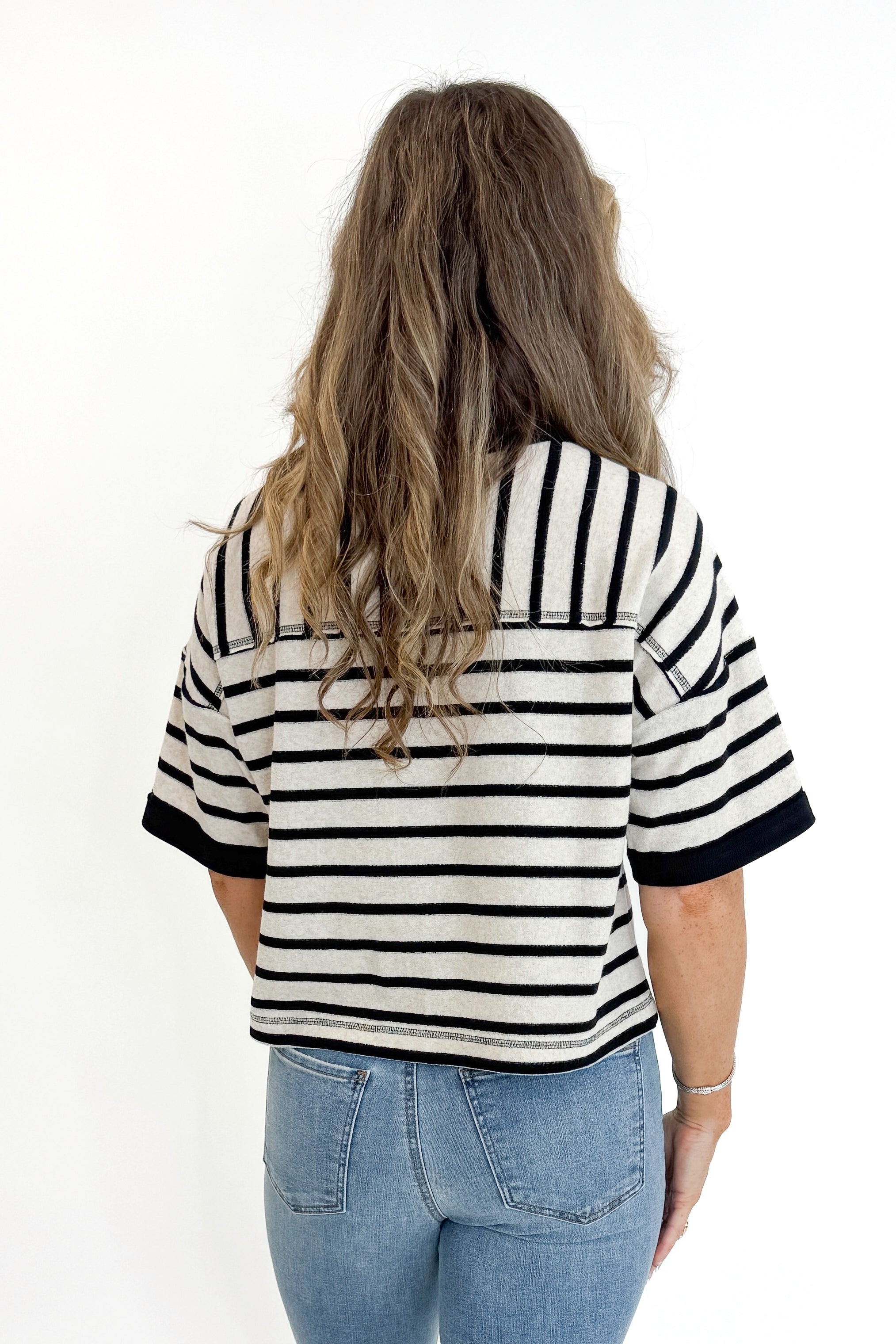 Back view of woman wearing Swagger Boutique&