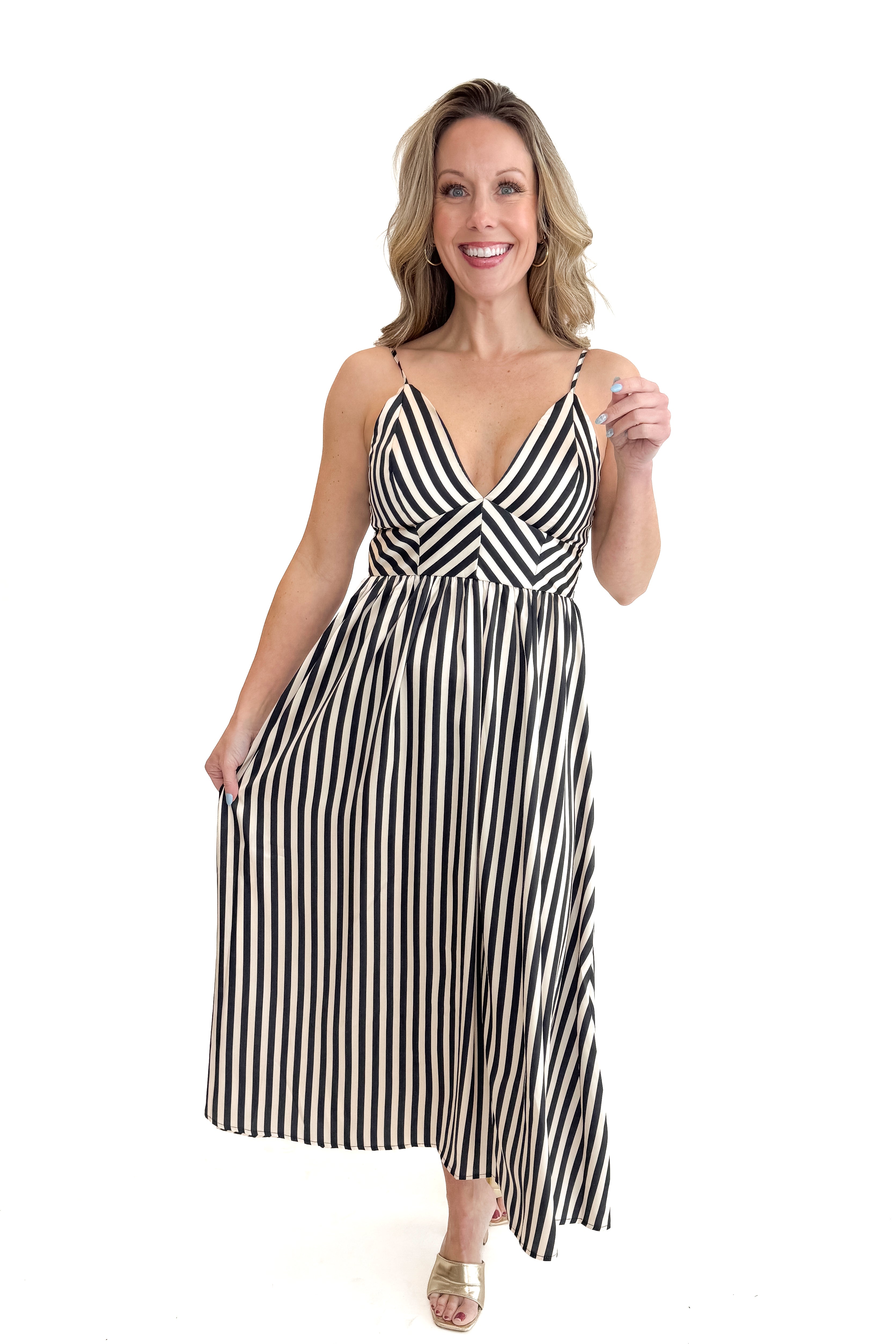 Front view of woman wearing Cream Satin Striped Midi Dress against white studio background.