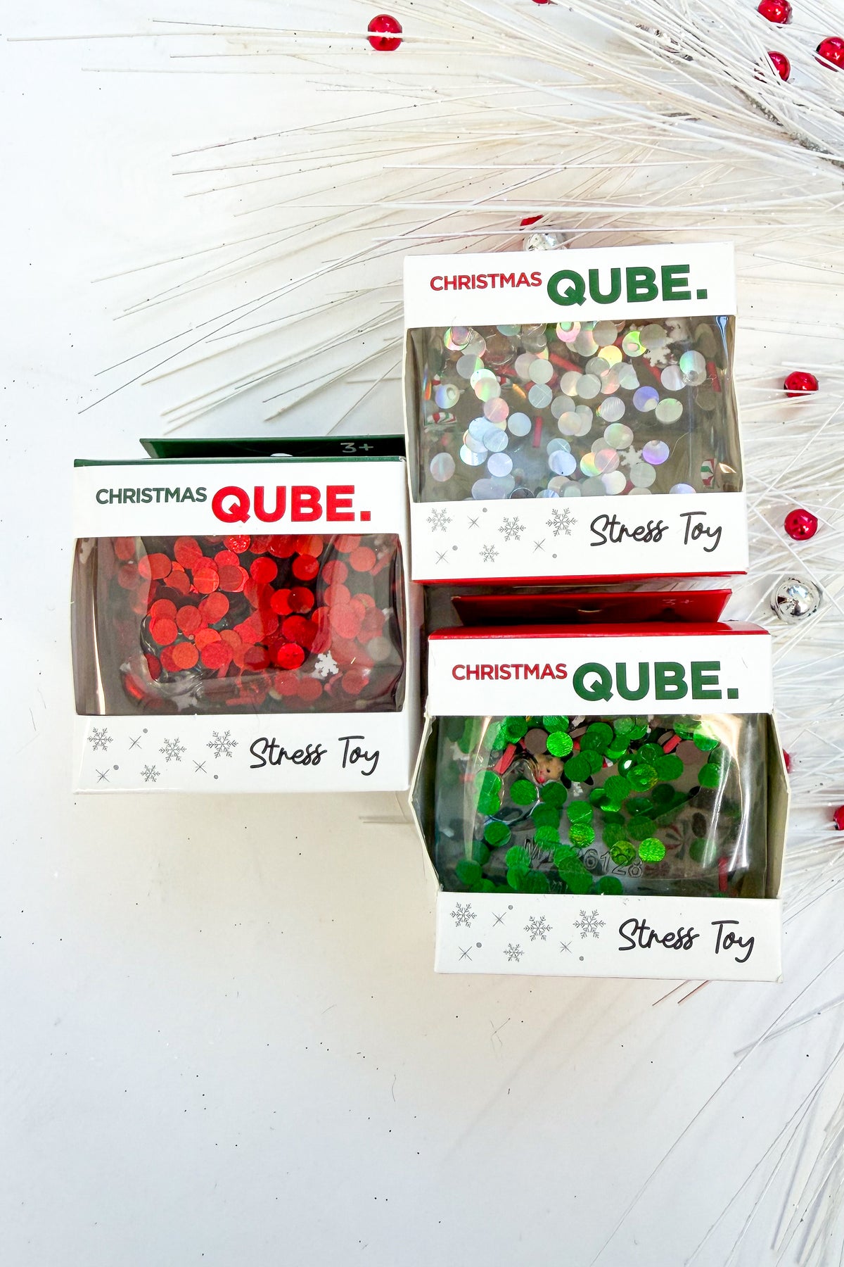 Christmas Qube against holiday background