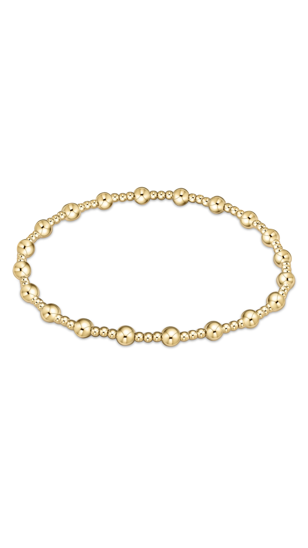 A gold beaded stretch bracelet featuring alternating polished round beads and smaller textured barrel beads, displayed in a horizontal oval shape on a clean white background.