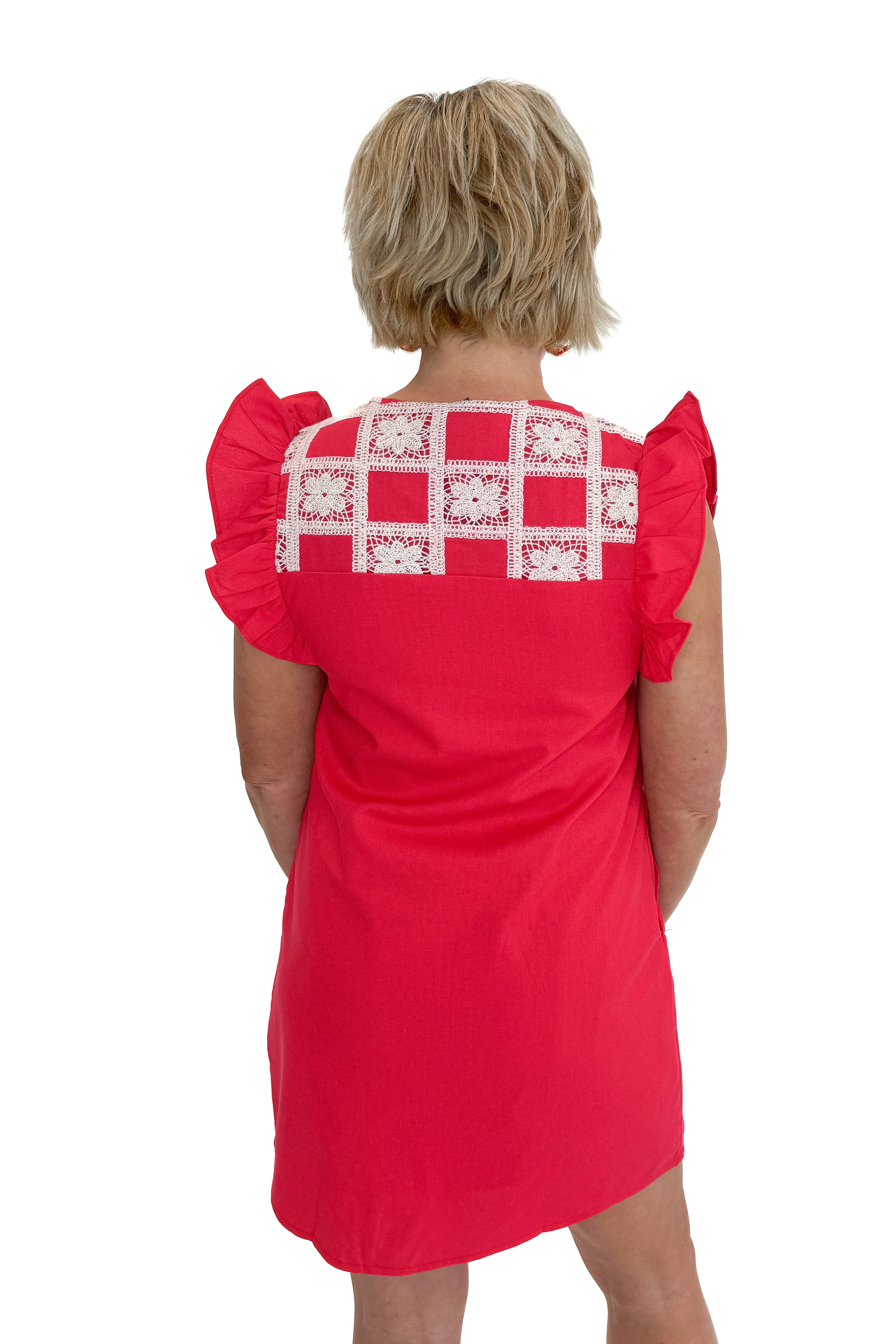 Back view of woman wearing Red Crochet Detail Mini Dress against white studio background.