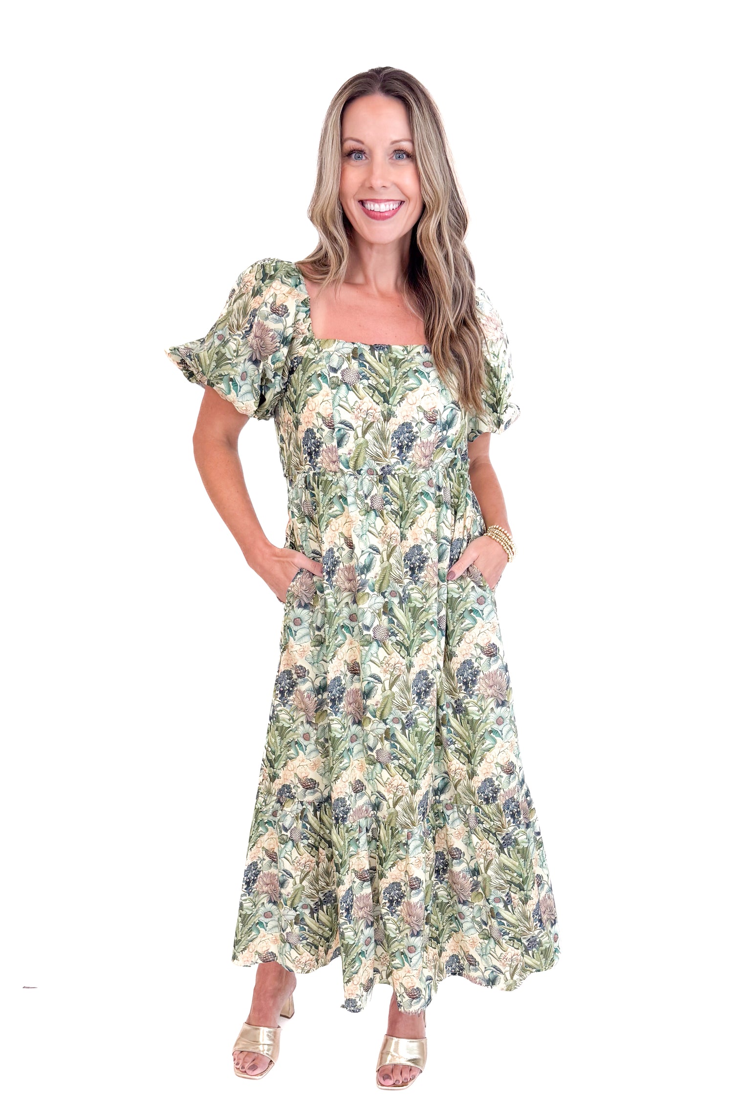 Woman wearing a floral dress on a white background