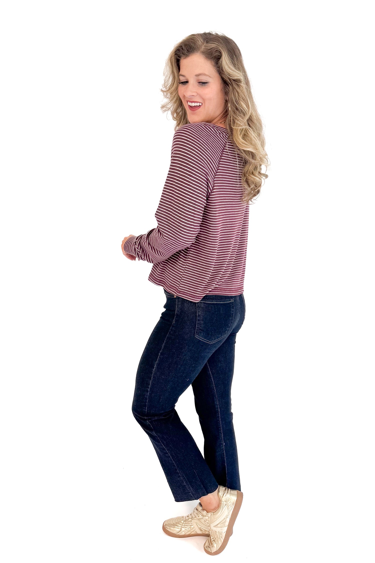 Full Circle wine and cream striped long sleeve top - side view on model