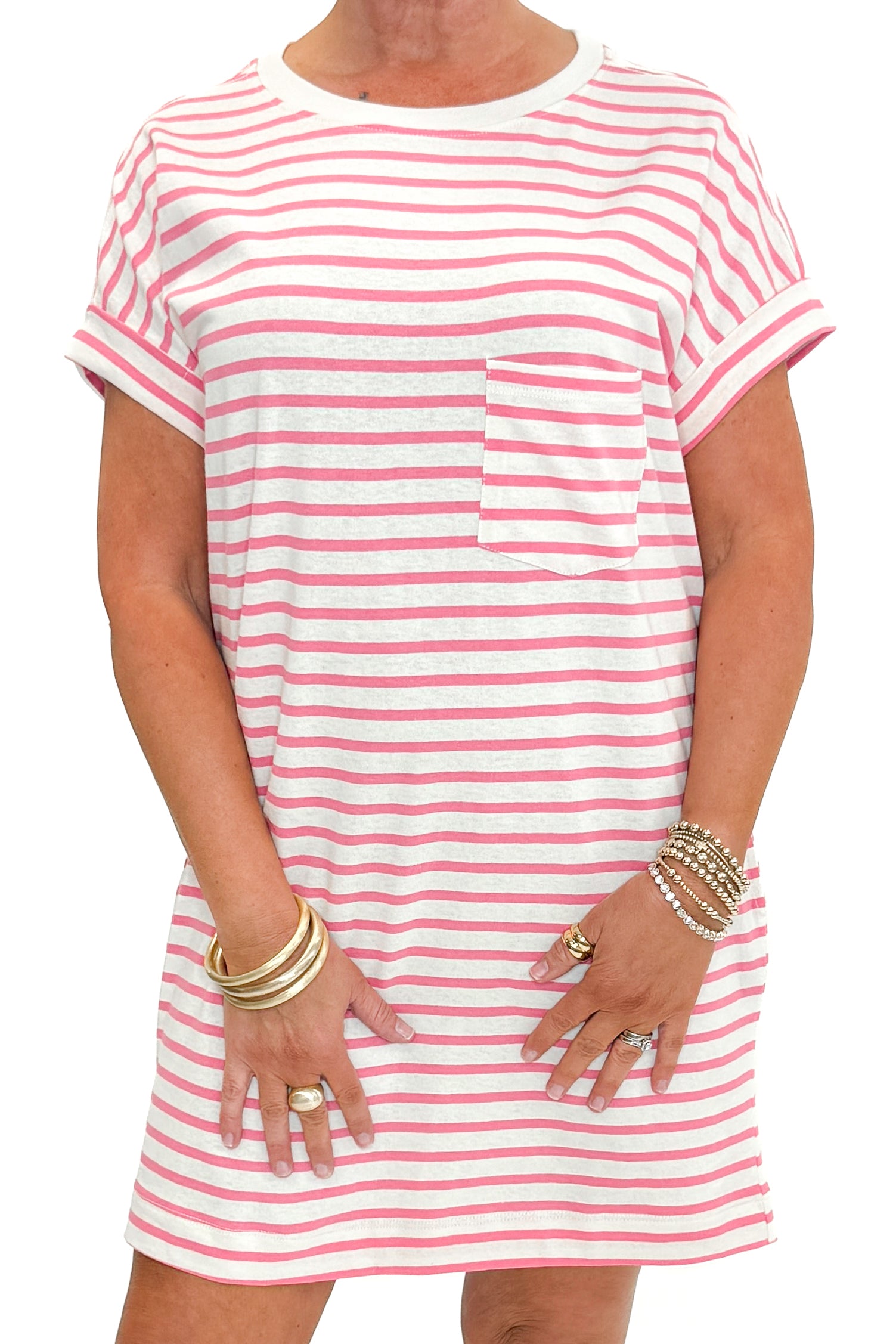 Front detail view of woman wearing Pink & Cream Striped Short Sleeve Dress against white studio background.