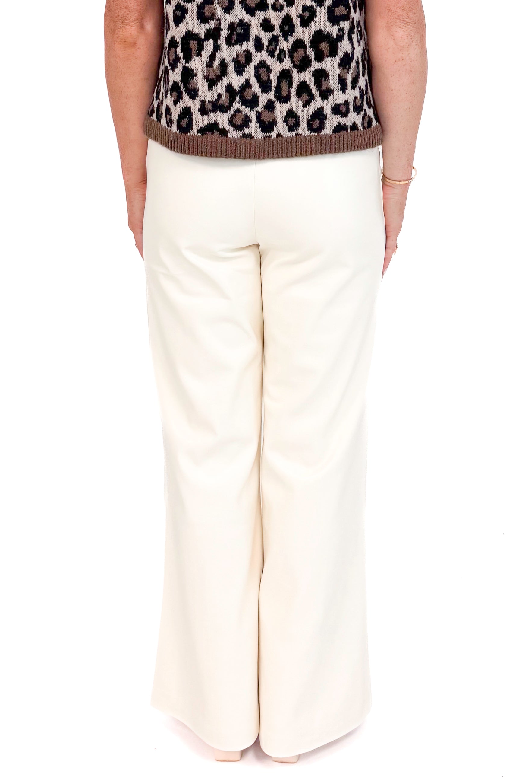 Back view of picture of woman wearing White Faux Leather Seam Detail Pants by Elan with white background.