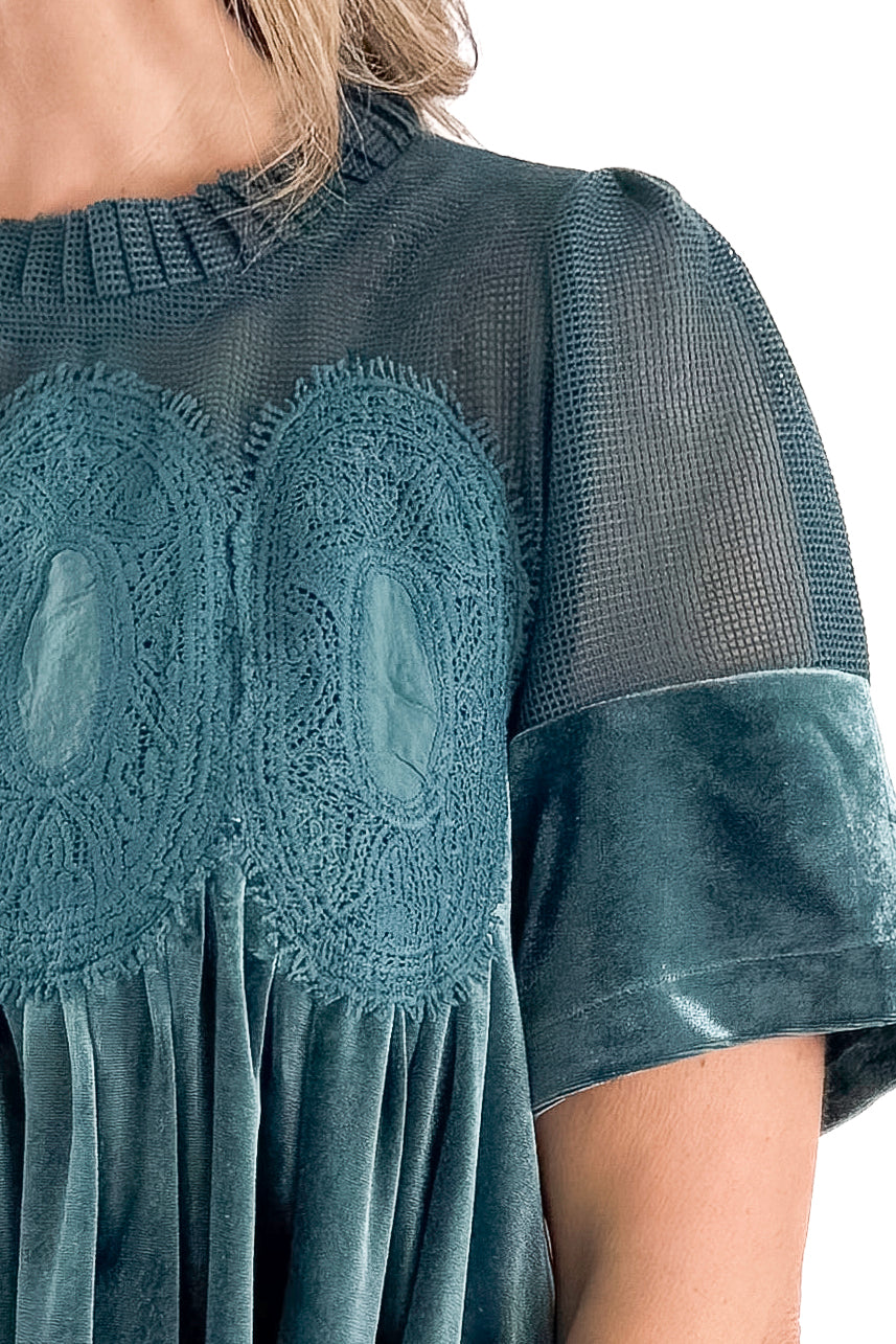 Front detailed view of woman wearing Teal Velvet With Lace Applique Top against white studio background.