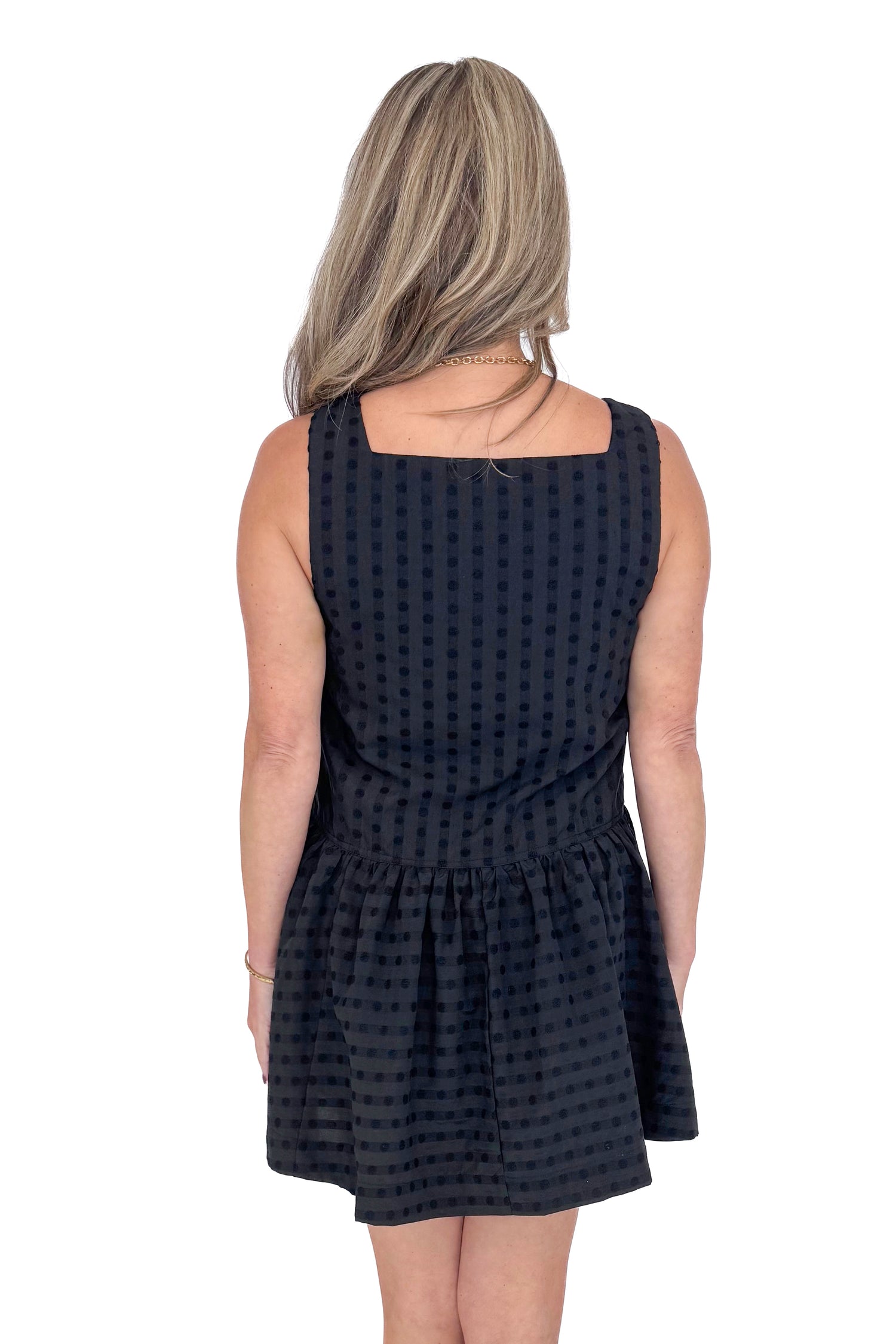 Back view of Woman wearing Black Square Neck Polka Dot Detail Dress against a white studio background.