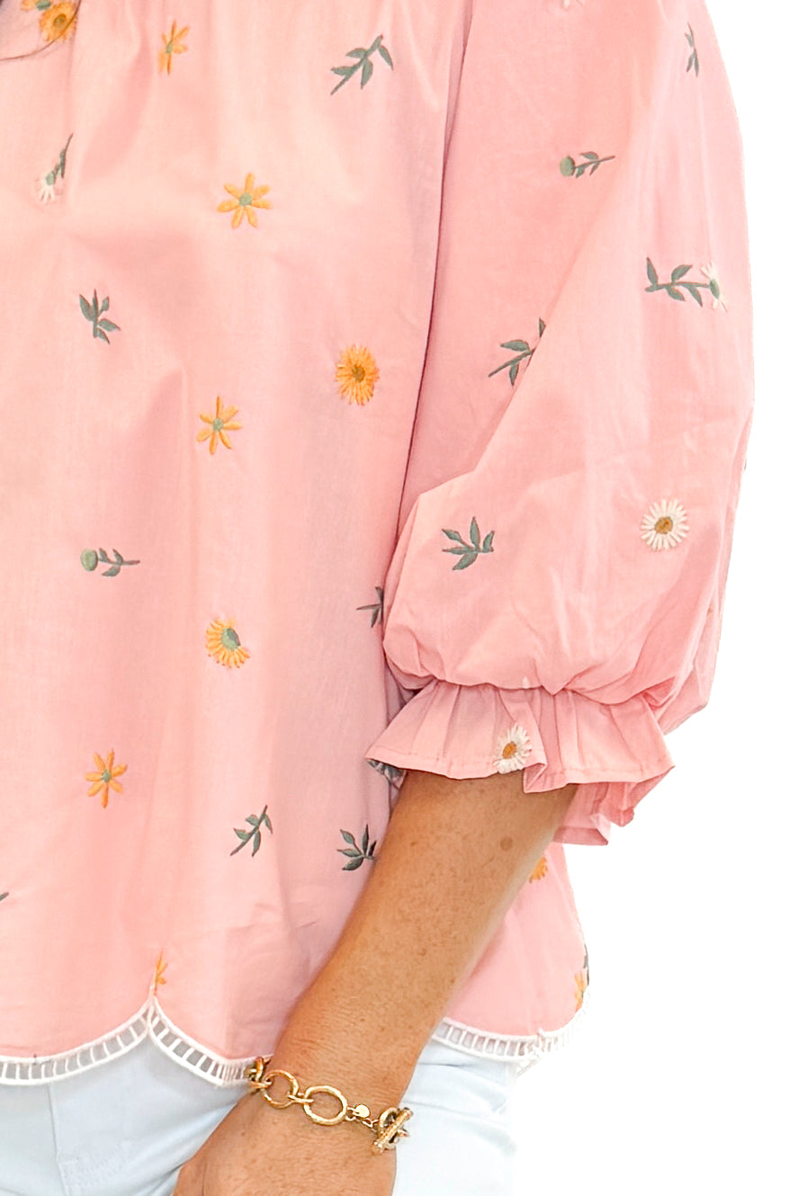 Front detail view of woman wearing Blush Embroidered Scallop Hem Top with jeans against white studio background.