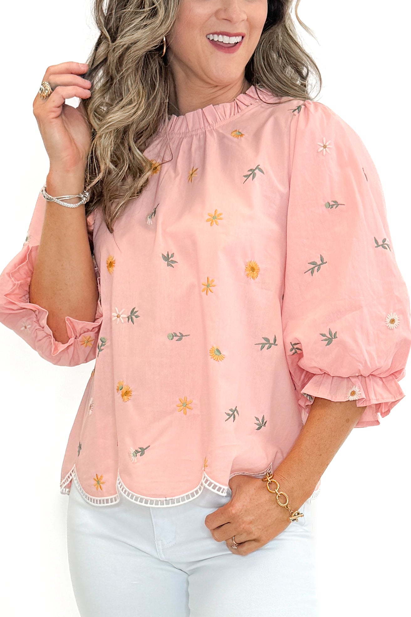 Front view of woman wearing Blush Embroidered Scallop Hem Top with jeans against white studio background.