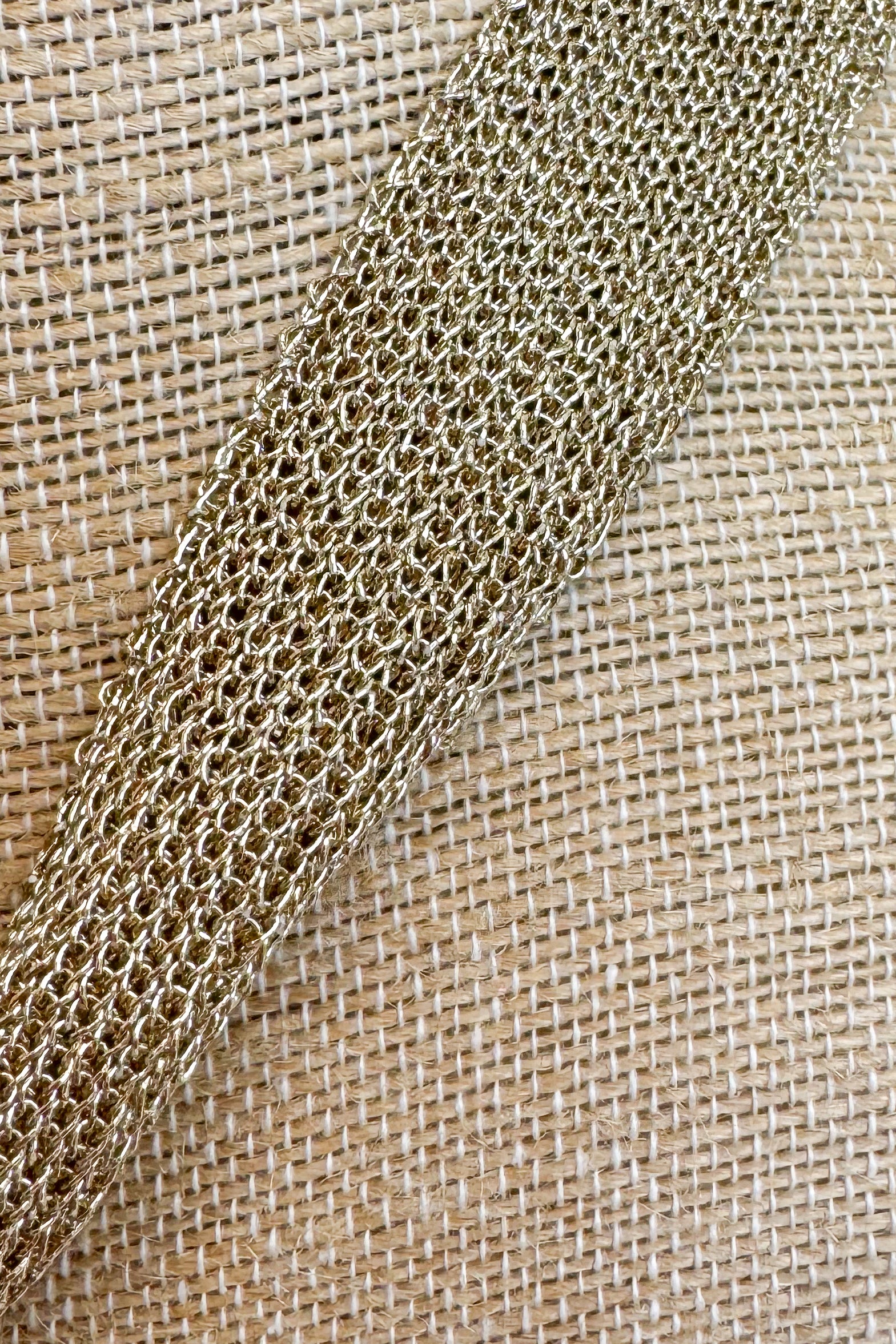 Close up of gold mesh necklace chain