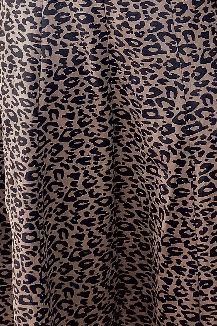 Detailed view of Leopard Suede Midi Dress pattern.