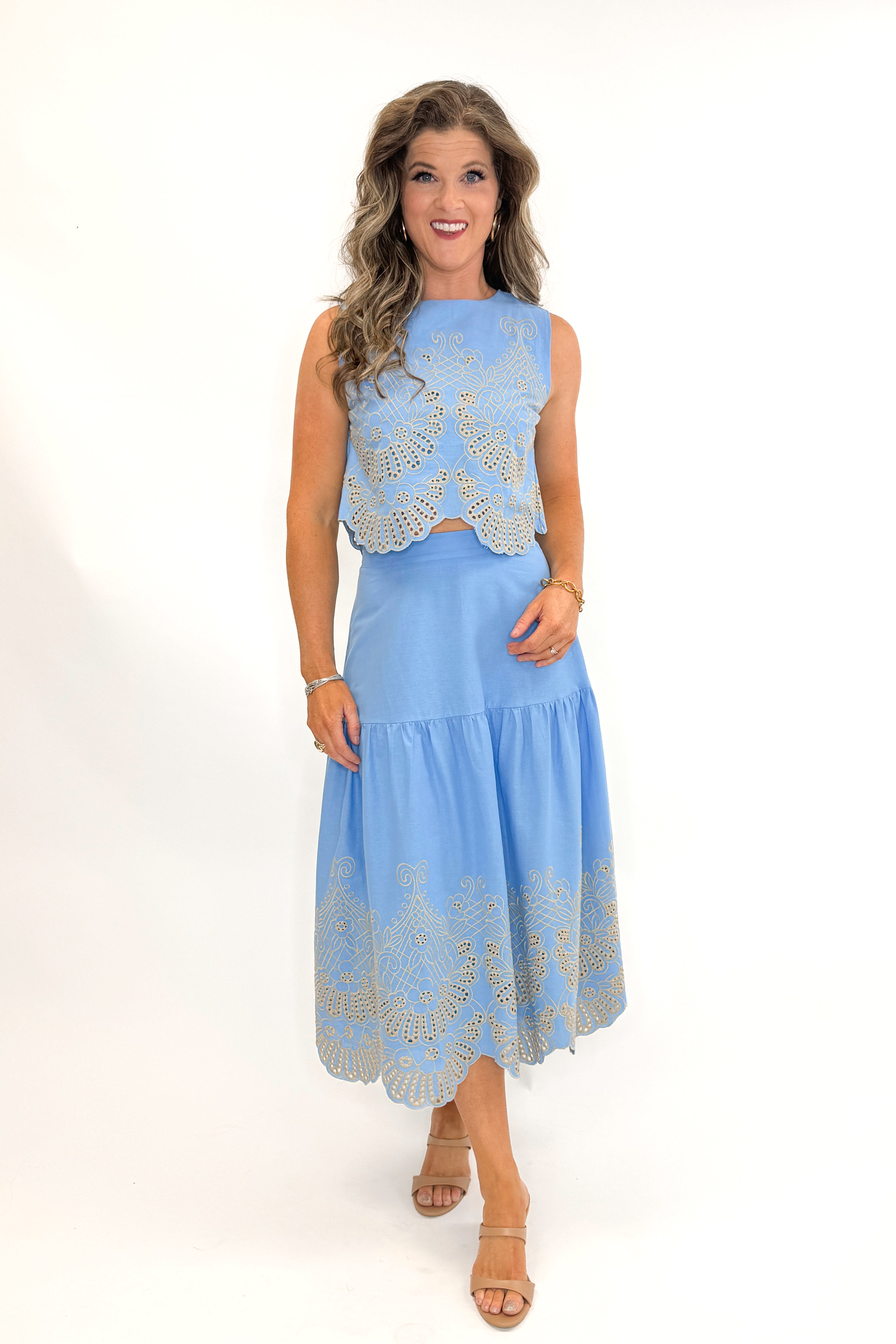 Front view of woman wearing Light Blue Eyelet Detail Tank with Light Blue Eyelet Detail Skirt against white studio background.