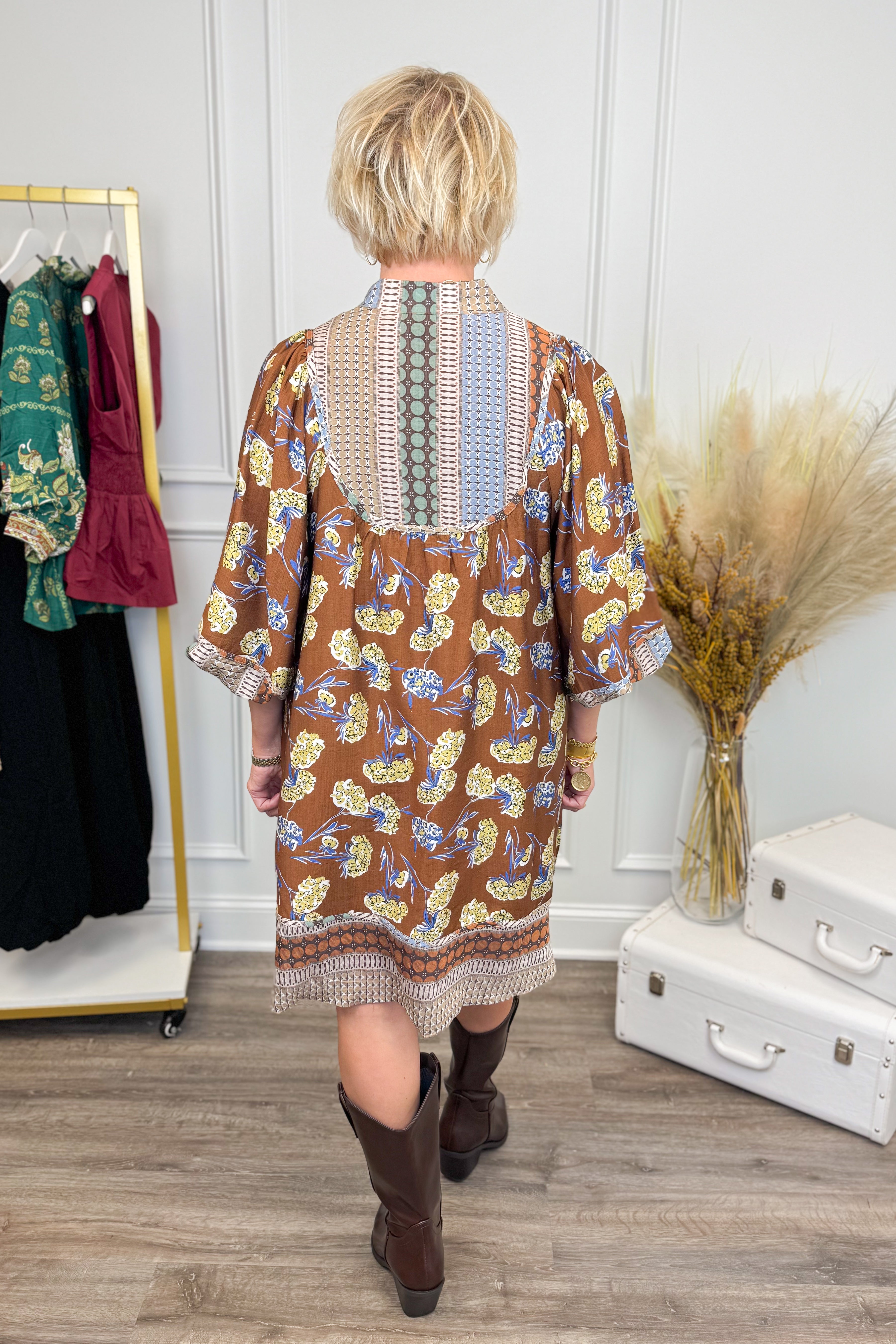 Woman wearing Golden Opportunity Brown & Multi Mixed Print 3/4 Sleeve Dress - rear view showing vibrant mixed print pattern and 3/4 sleeves