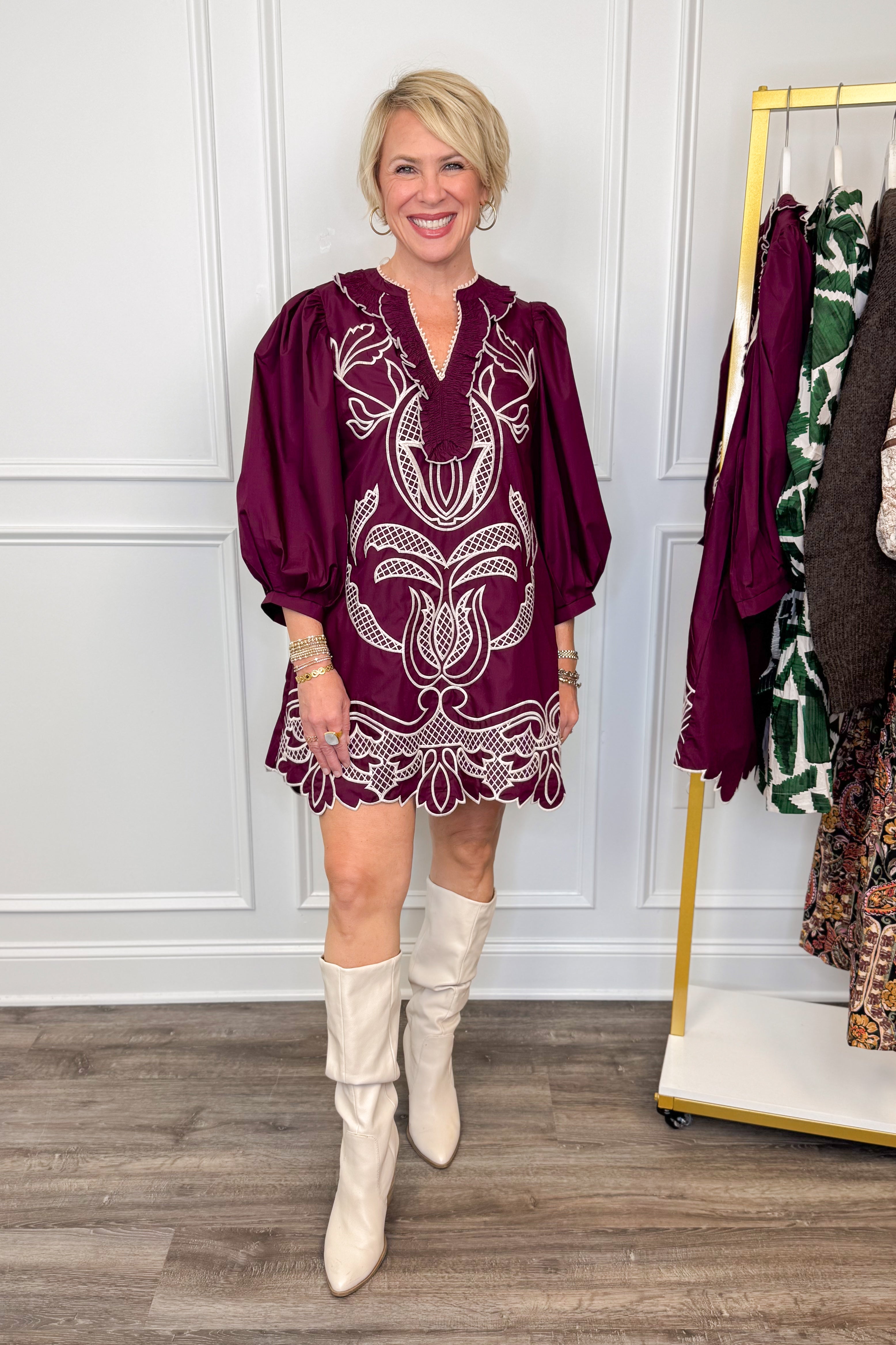 woman wearing burgundy embroidered dress