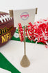 red dotted hoops earrings with sports themed background