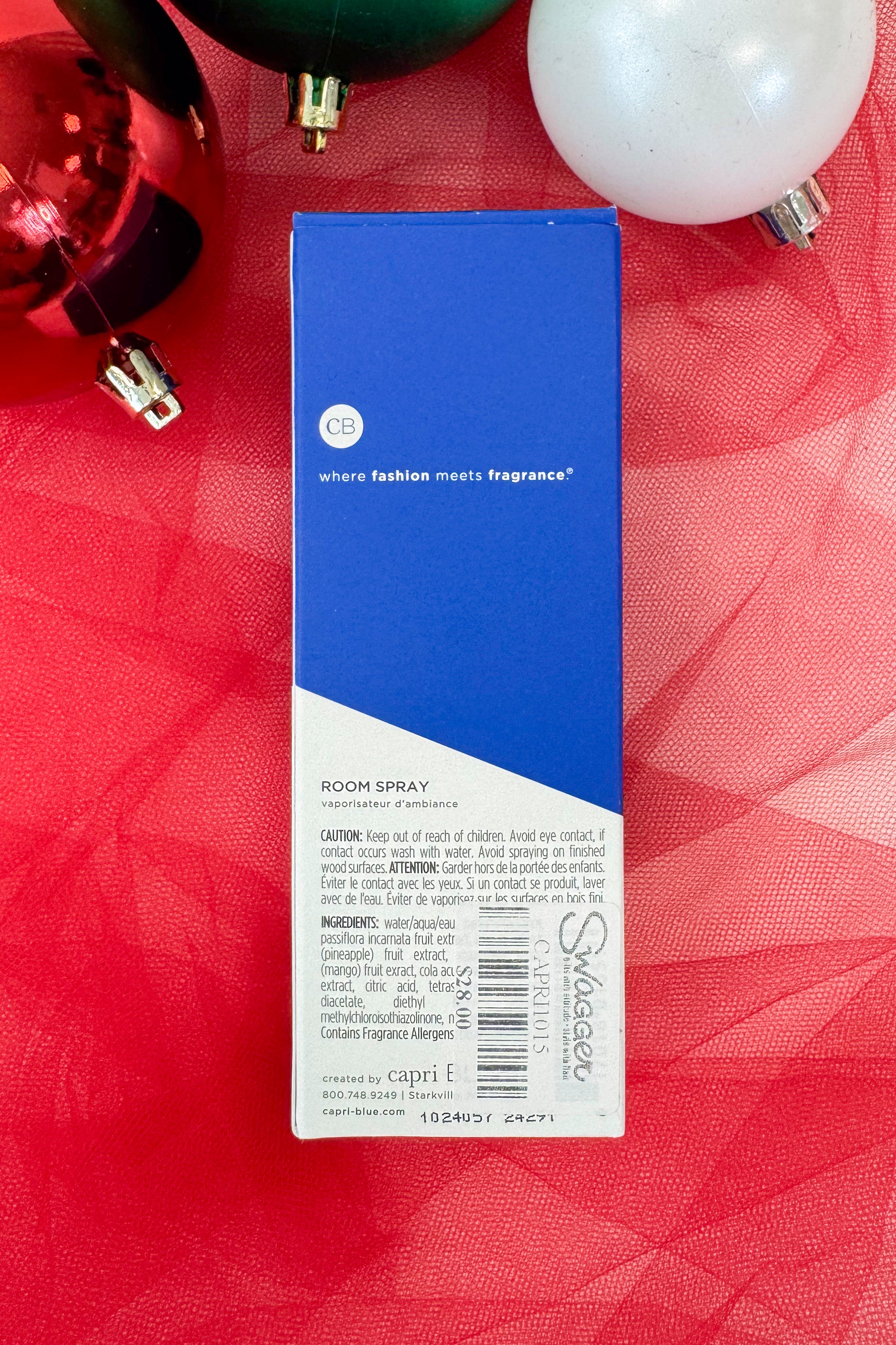 Blue room spray bottle with &