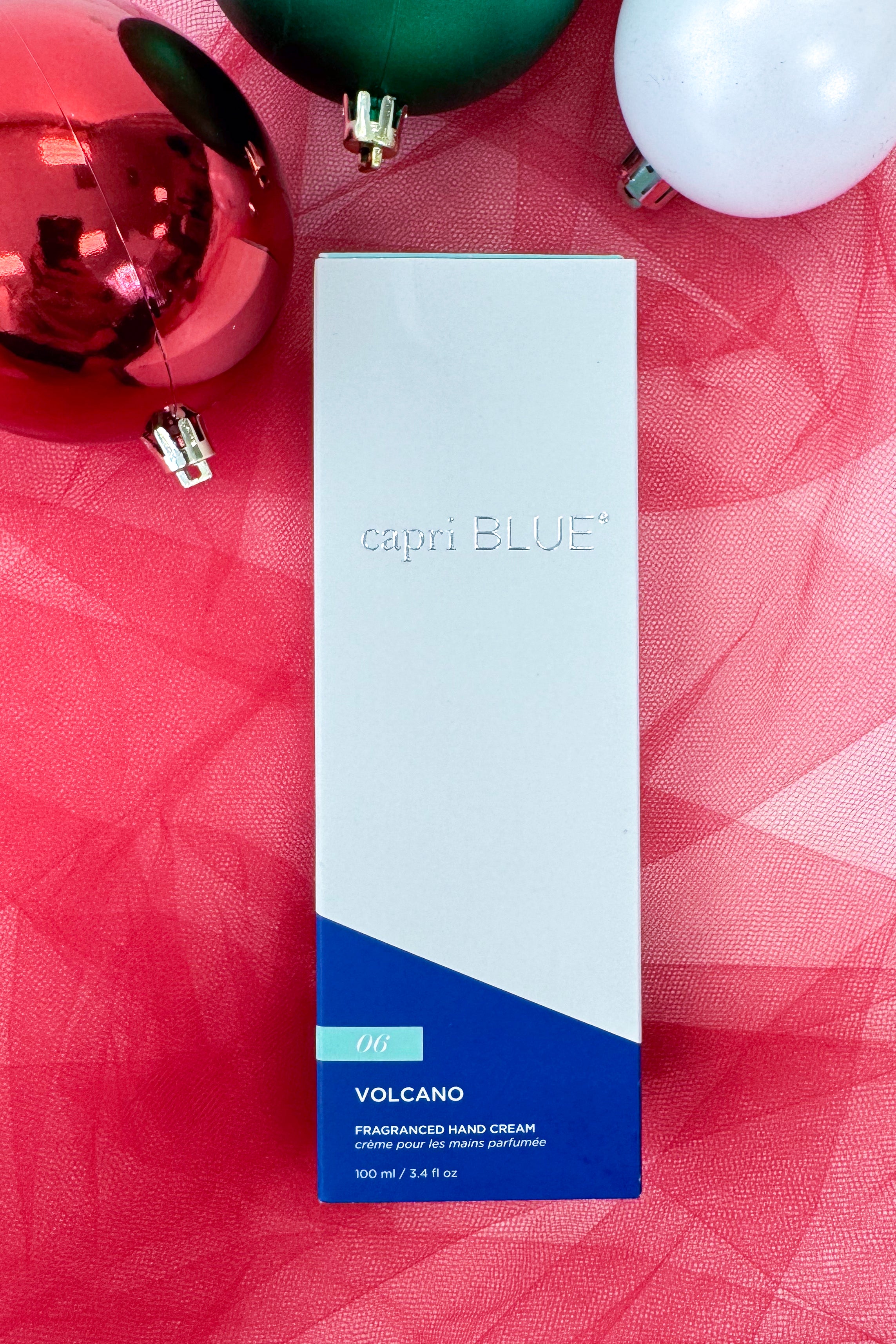 Capri Blue Volcano fragranced hand cream on a festive background