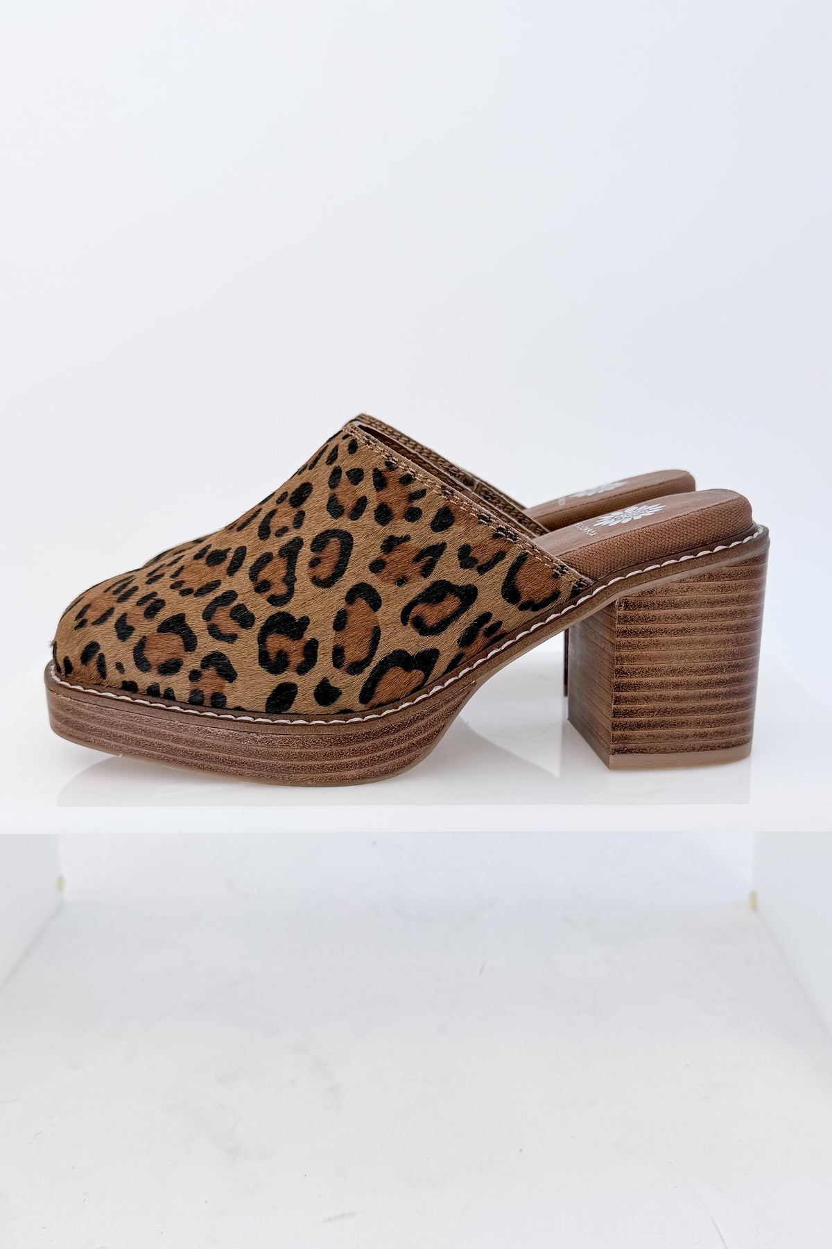 Idalina- Leopard Clog against white studio background side view.