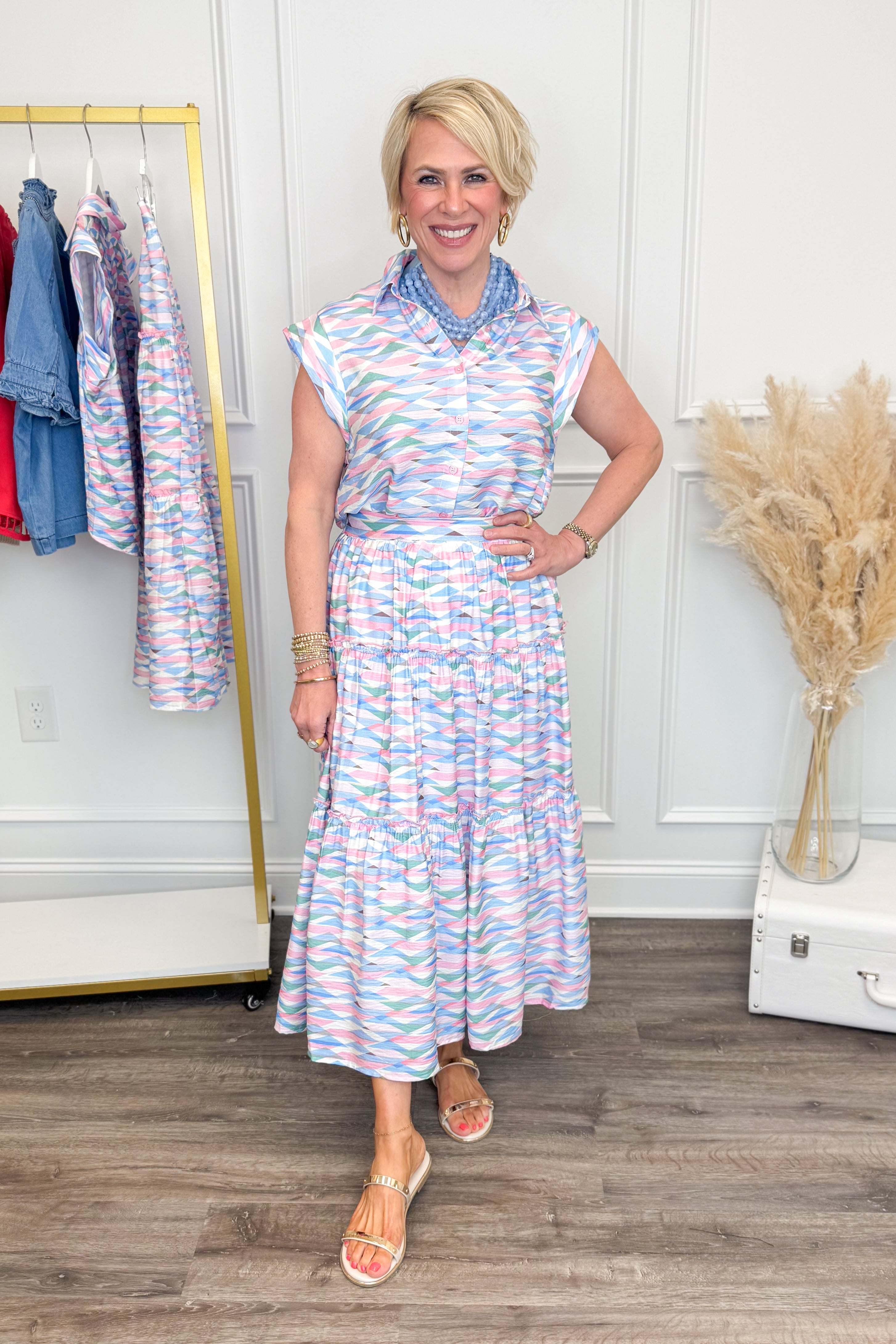 Front view of woman wearing Just A Little Something Pink & Blue Abstract Print Top with matching skirt at Swagger Boutique.