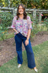 A New Season pink and blue paisley printed top and jeans - full length model shot outside