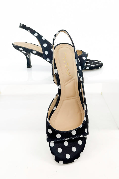 Keep- Black & White Polka Dot Kitten Heels against white studio background front view.