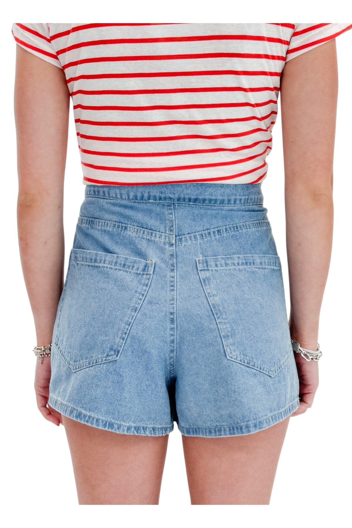 Back detail view of woman wearing Swagger Boutiqueās Lychee Junie Striped Tee by Z Supply with Light Wash Denim Wrap Skort against white studio background.