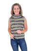 Woman wearing a sleeveless striped sweater and jeans on a white background