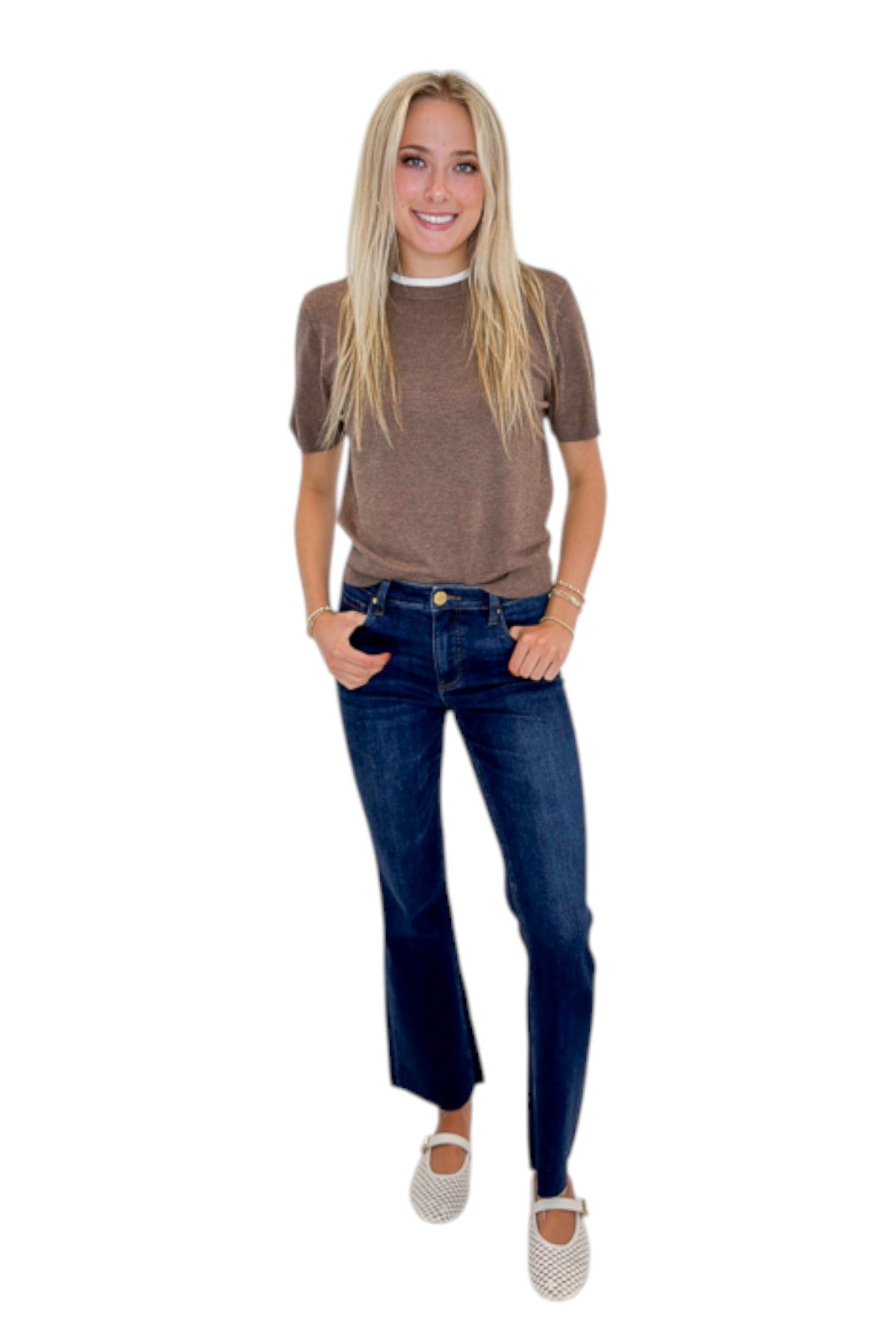 Front view of woman wearing Swagger Boutique’s Mocha Double Collared Top with jeans against white studio background.
