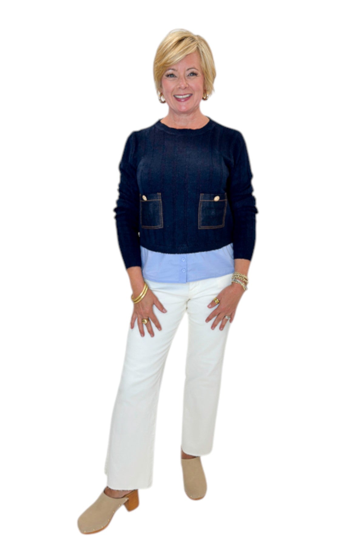 Front view of woman wearing Swagger Boutiqueās Navy & Denim Pocket Sweater with jeans against white studio background.