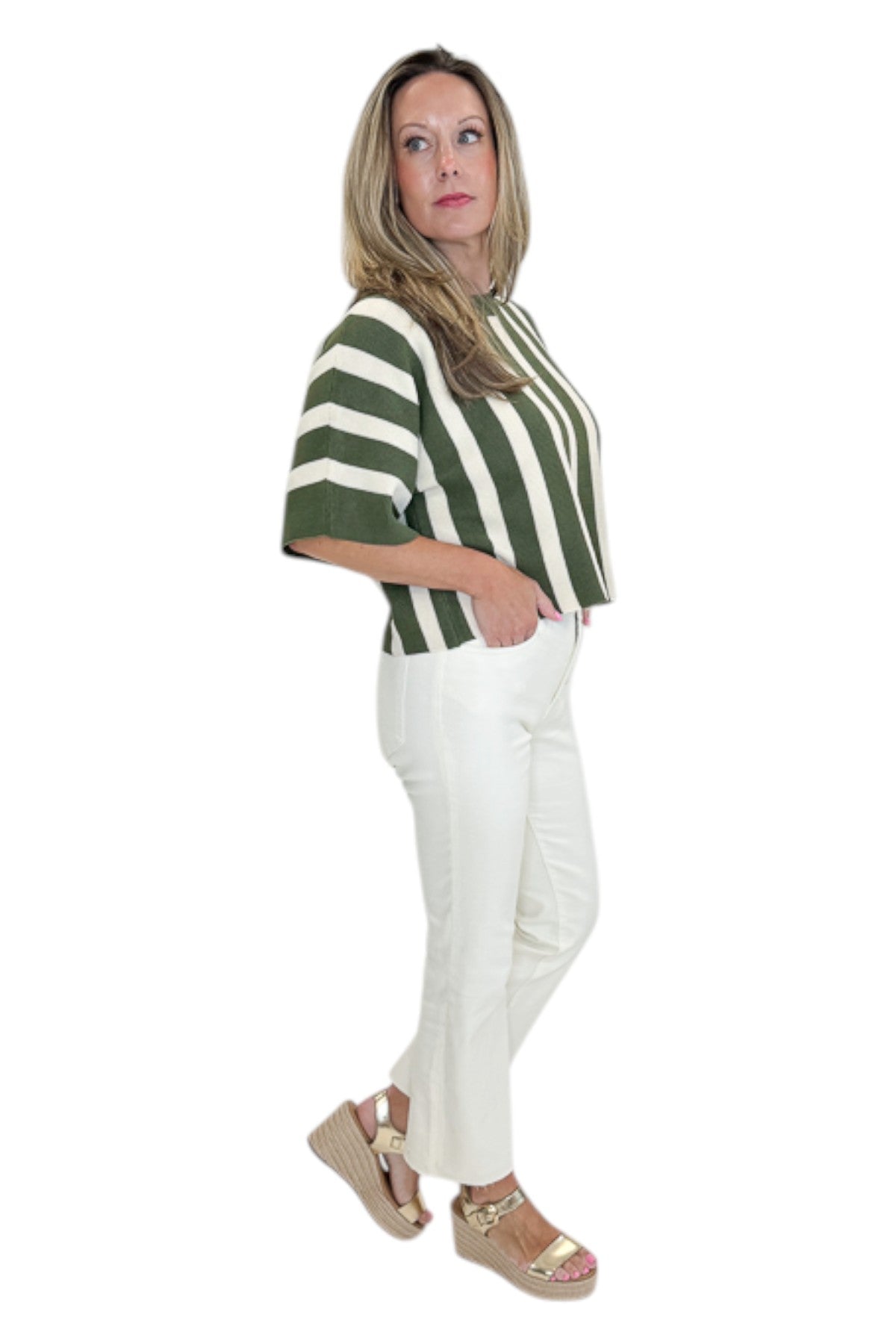 Side view of woman wearing Swagger Boutiqueās Olive & Cream Striped Short Sleeve Sweater by Entro with jeans against white studio background.