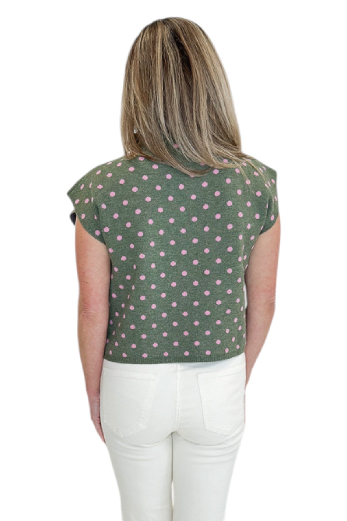 Back view of woman wearing Swagger Boutiqueās Olive & Pink Polka Dot Sleeveless Sweater by Entro with jeans against white studio background.