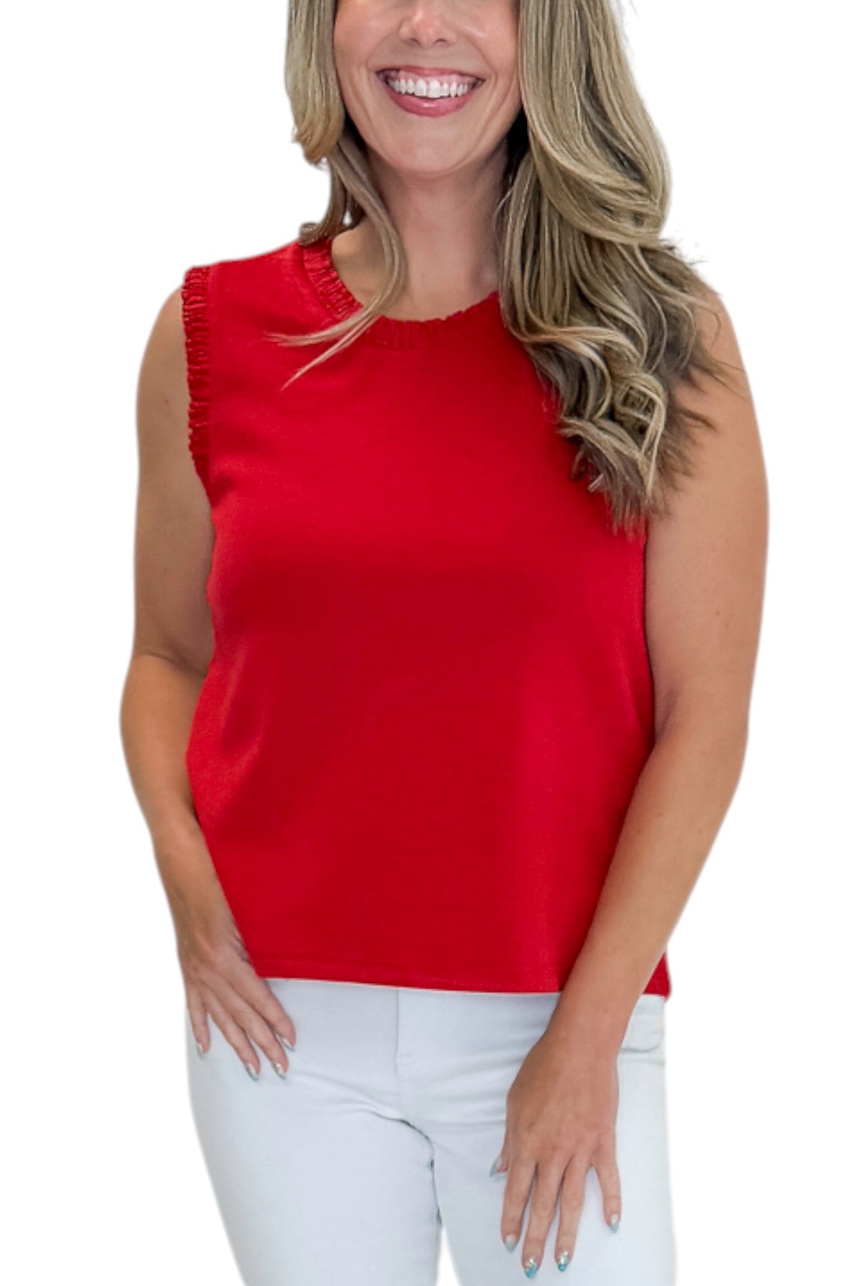 Front detail view of woman wearing Swagger Boutiqueβs Red Smocked Trim Tank with jeans against white studio background.