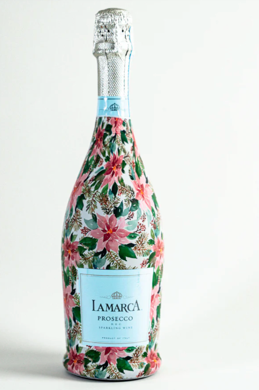 Bottle of Iamarca Prosecco with floral design on a white background